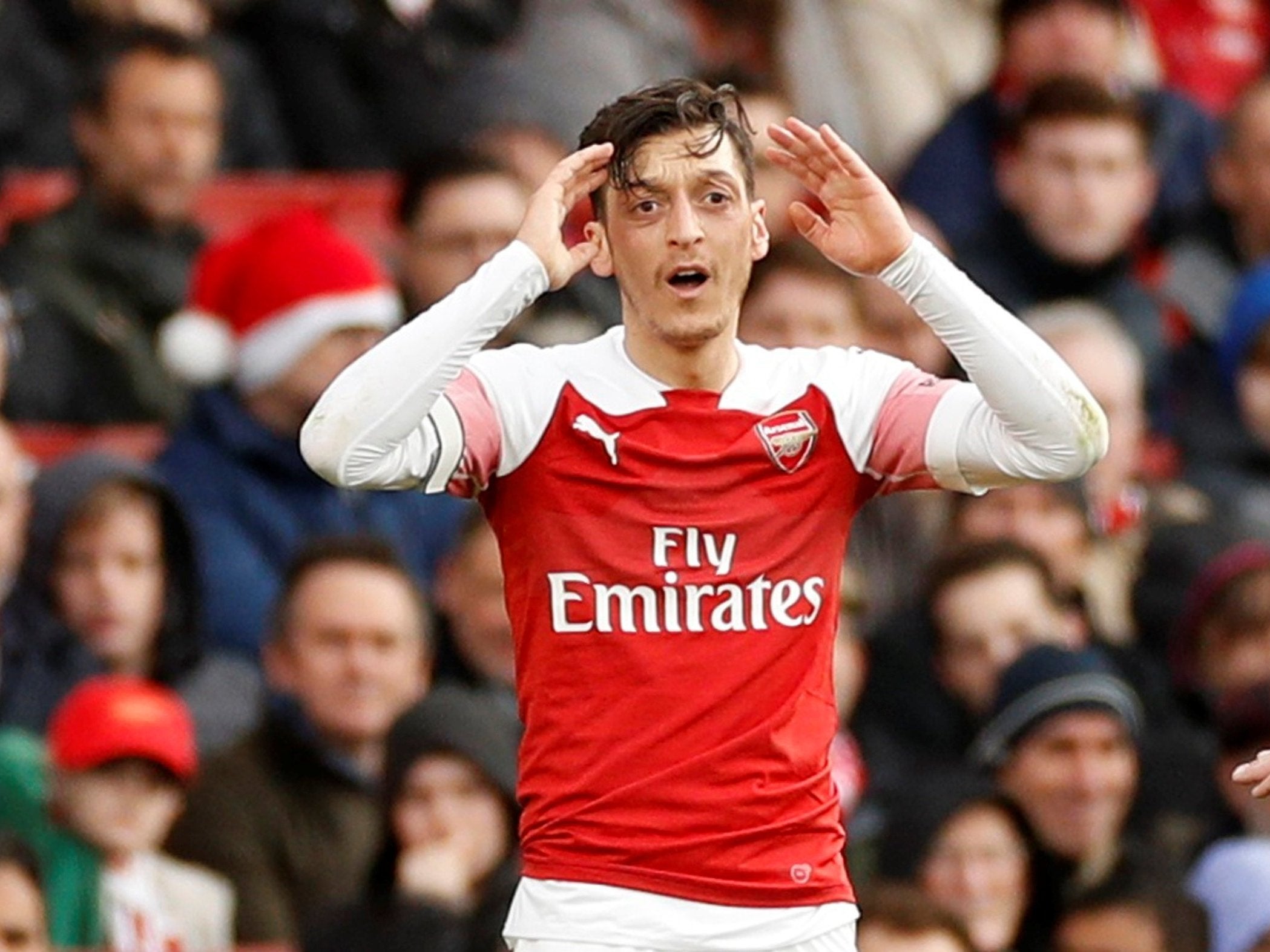 Ozil's agent insists the midfielder is happy at Arsenal for the foreseeable future