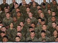 Male and female US marines begin training together at boot camp for first time