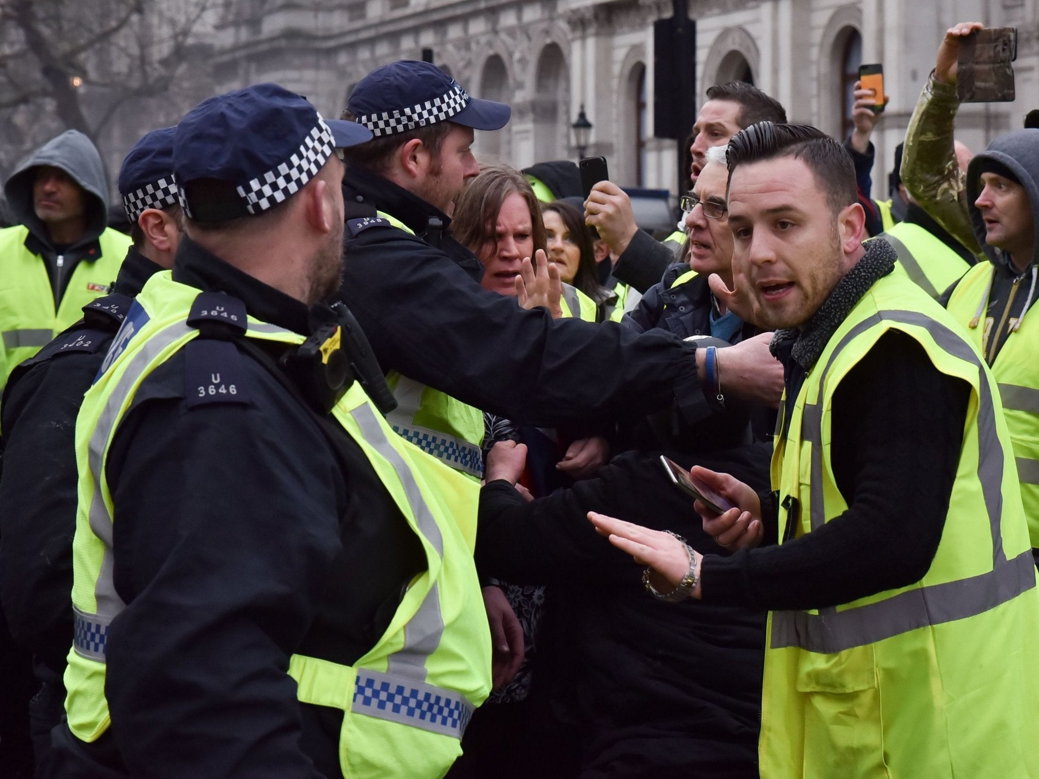 Yellow vests scuffle with police in Whitehall on Saturday (Rex)