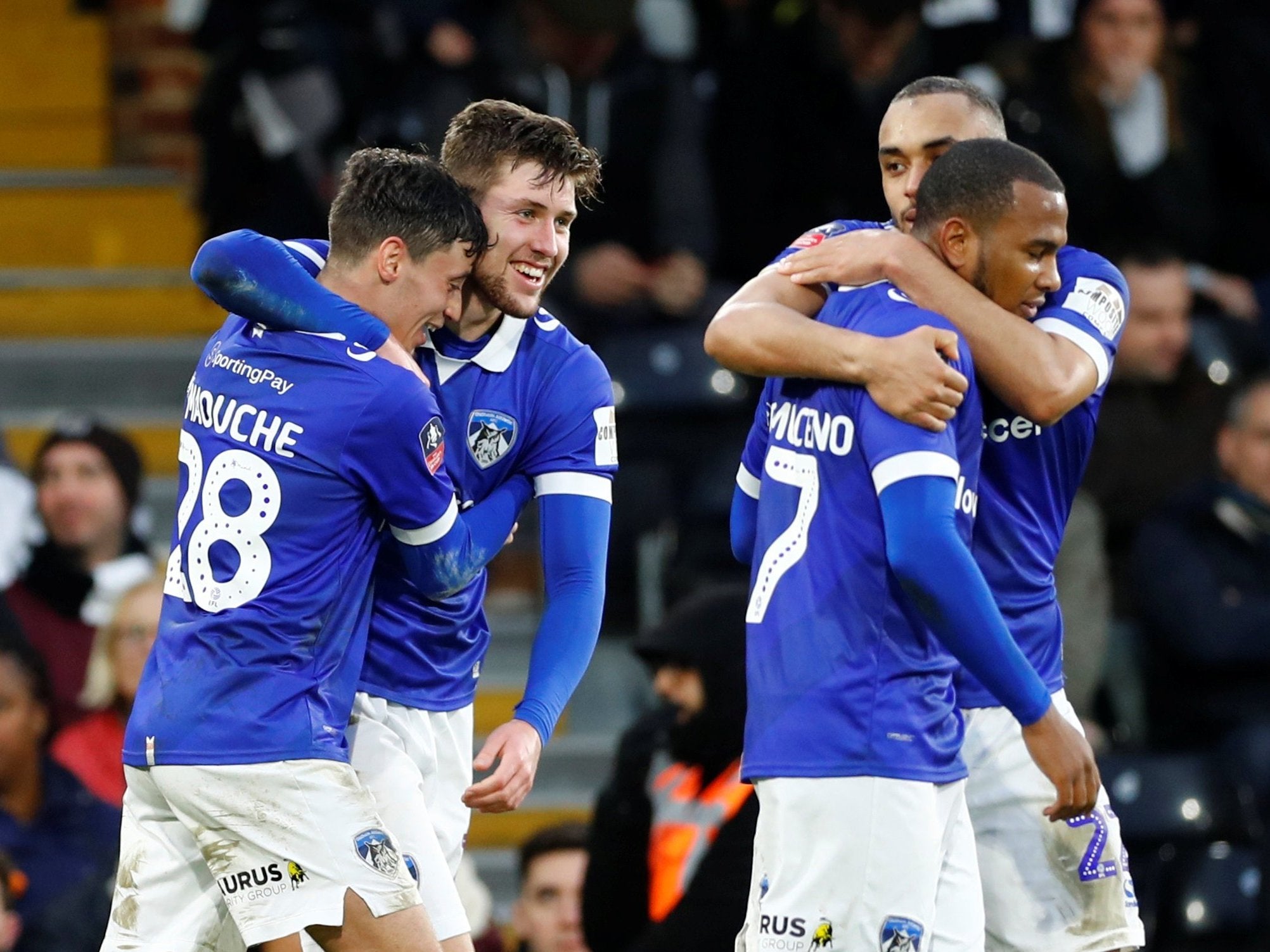 Callum Lang celebrates scoring Oldham's winning goal against Fulham