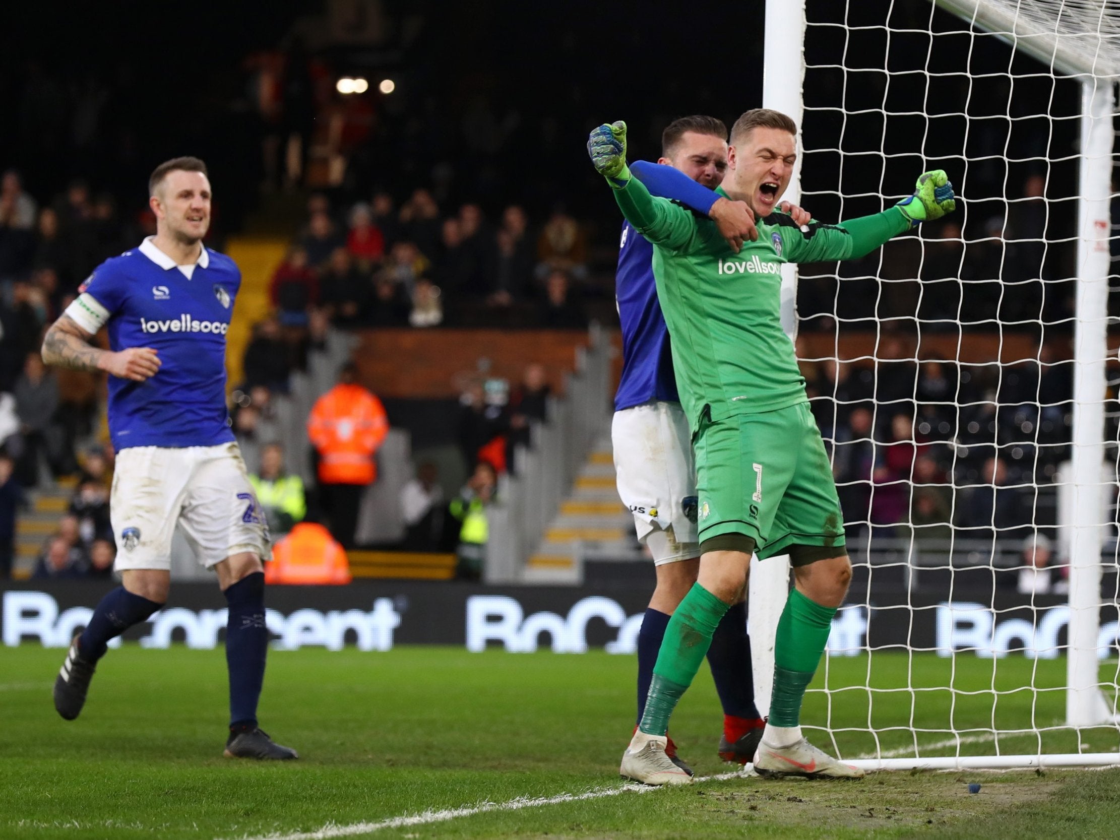 Iversen celebrates after saving Mitrovic's penalty effort