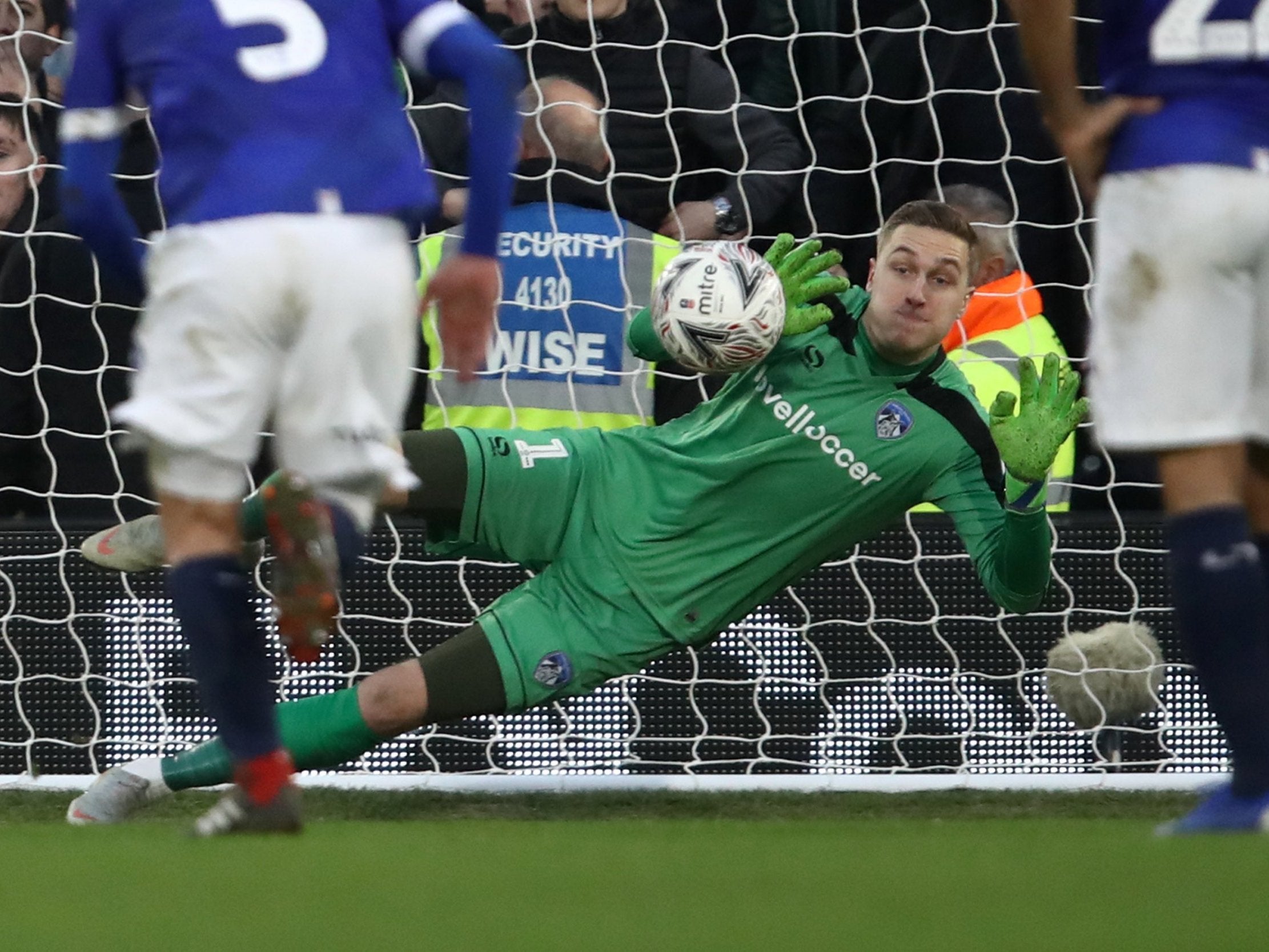 Iversen saved Mitrovic's penalty minutes before Oldham scored the winning goal