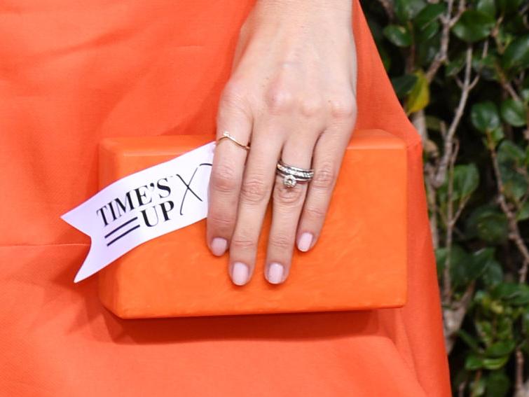 US actress D’Arcy Carden held a tag reading ‘Time’s Up’ as she arrived for the 76th annual Golden Globe Awards