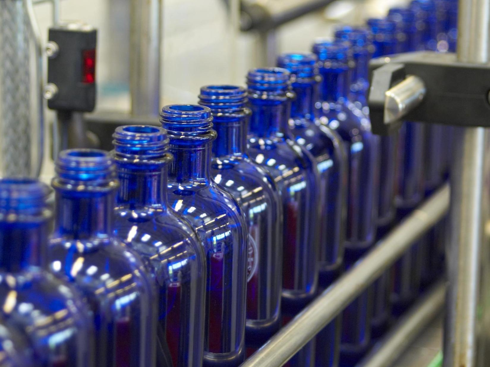 British-owned company Neal’s Yard Remedies is known for its iconic blue glass bottles (Neal’s Yard Remedies)