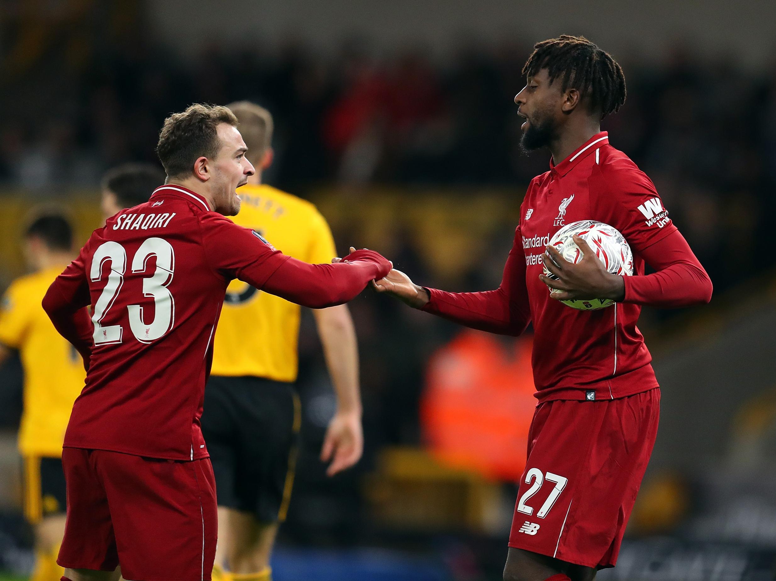 Divock Origi is congratulated by Xherdan Shaqiri (Getty Images)