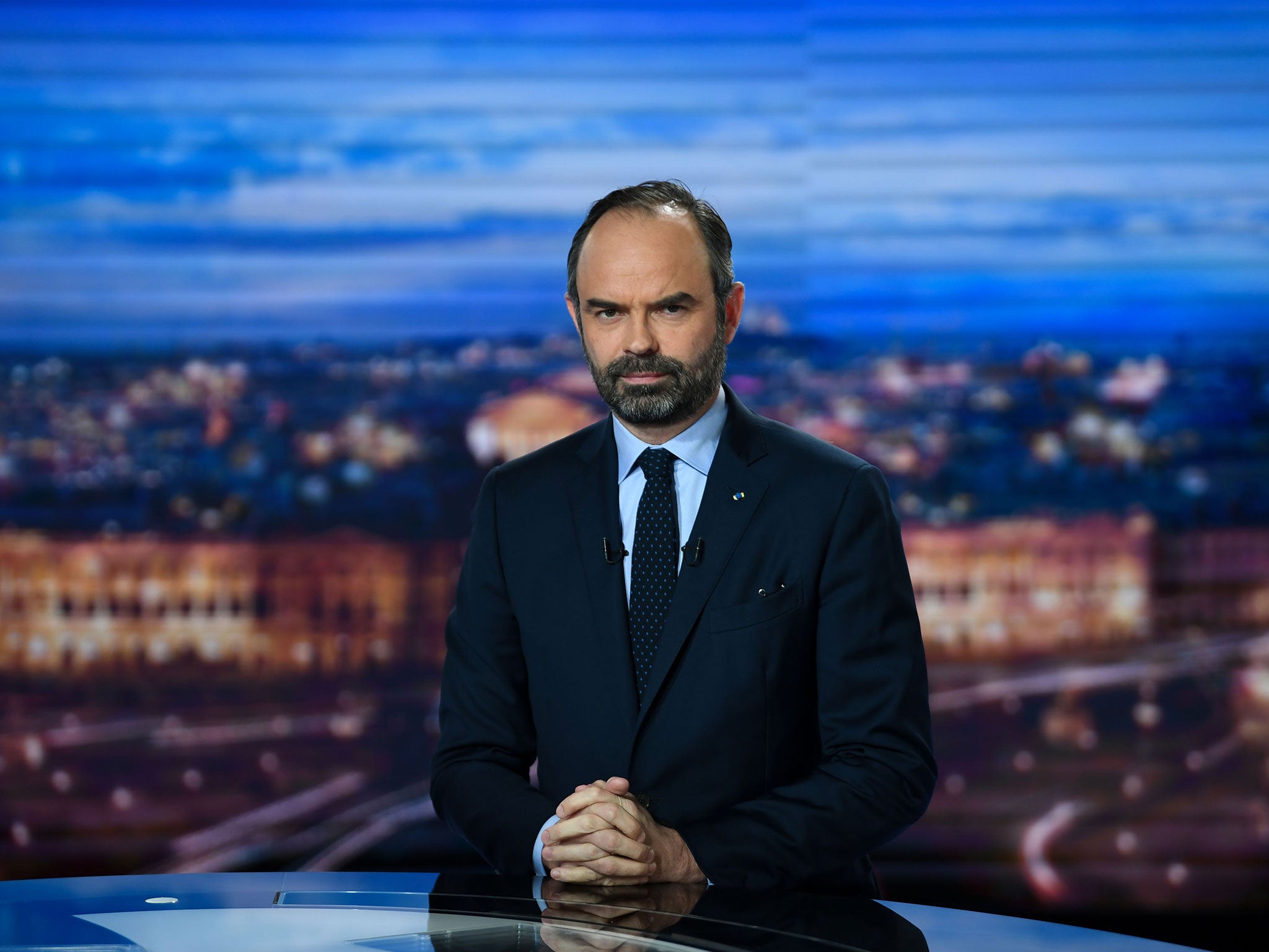 French prime minister Edouard Philippe speaking on television to announce the new sanctions