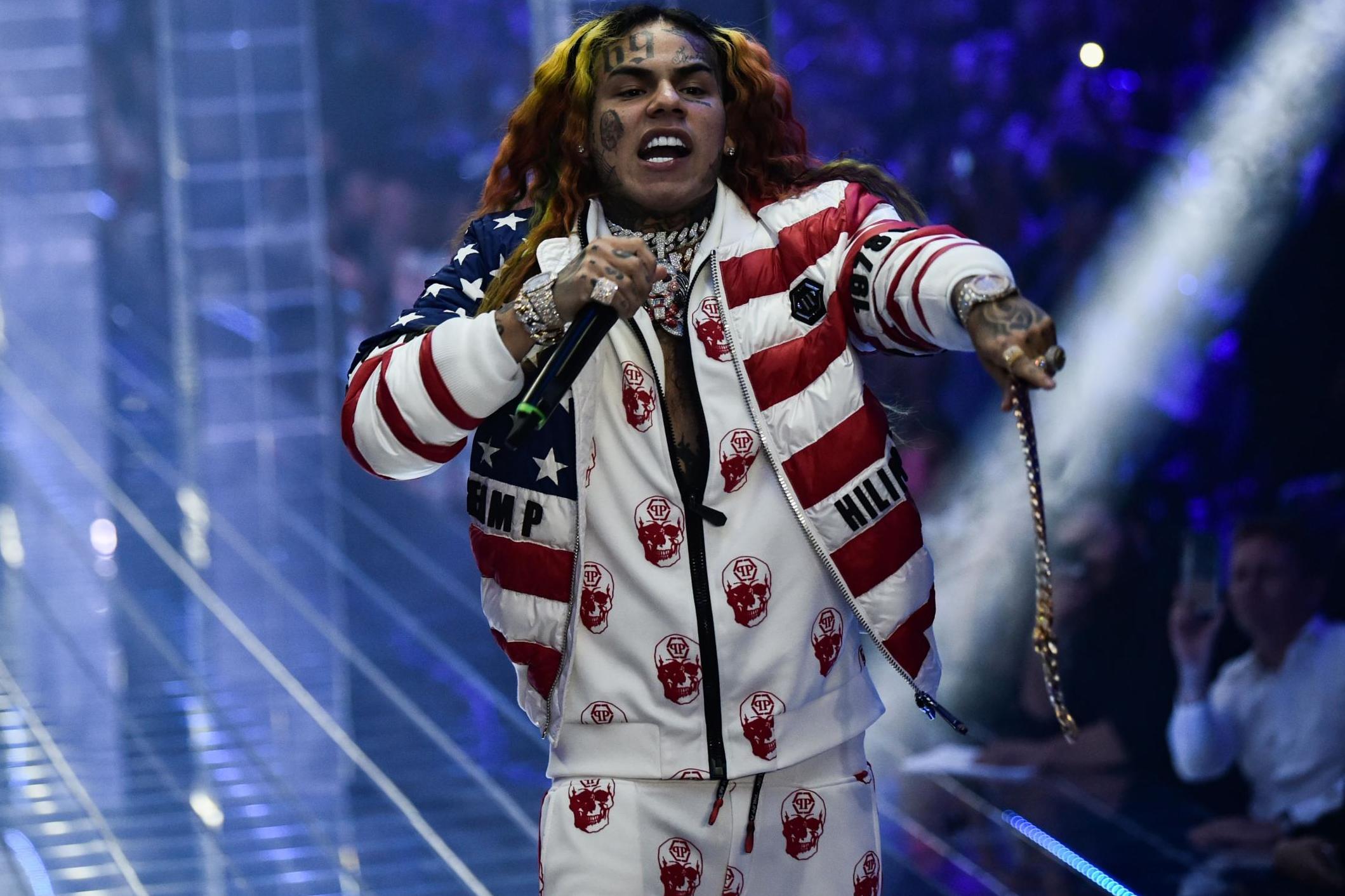 Tekashi 6ix9ine performs during the Philipp Plein fashion show as part of the Women's Spring/Summer 2019 fashion week in Milan, on 21 September, 2018.