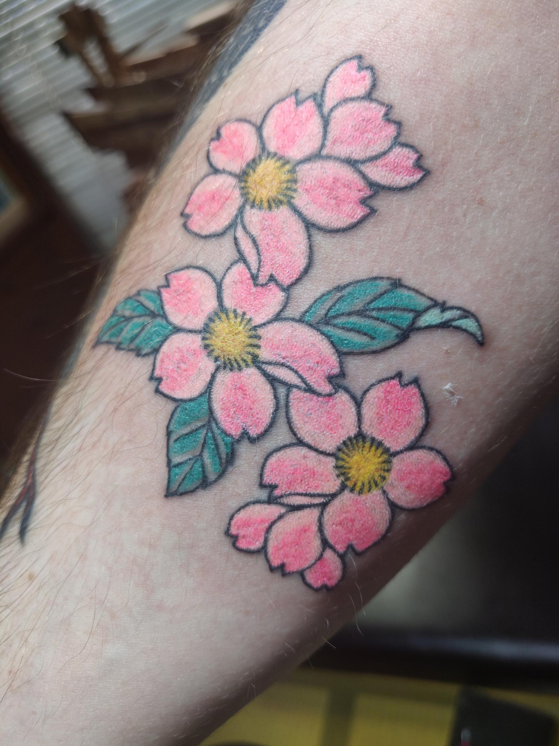 In bloom: Andrew’s ‘sakura’ tattoo on his forearm