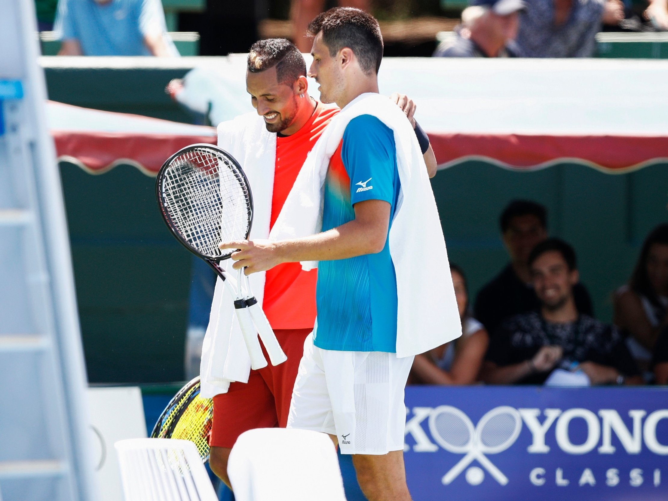 Kyrgios and Tomic laugh after their match