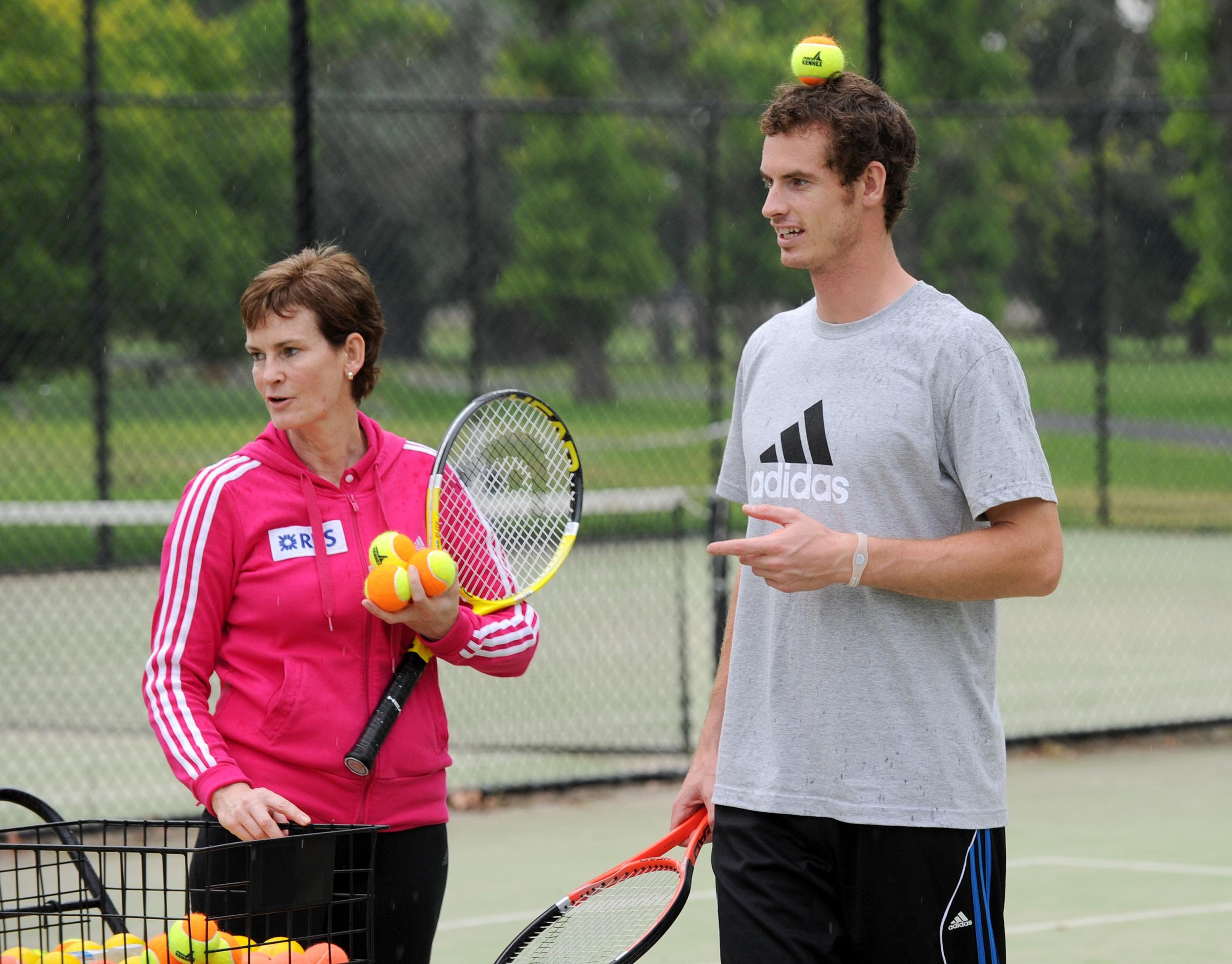 Murray and his mother, Judy Murray, coach young tennis players in Melbourne, 2011