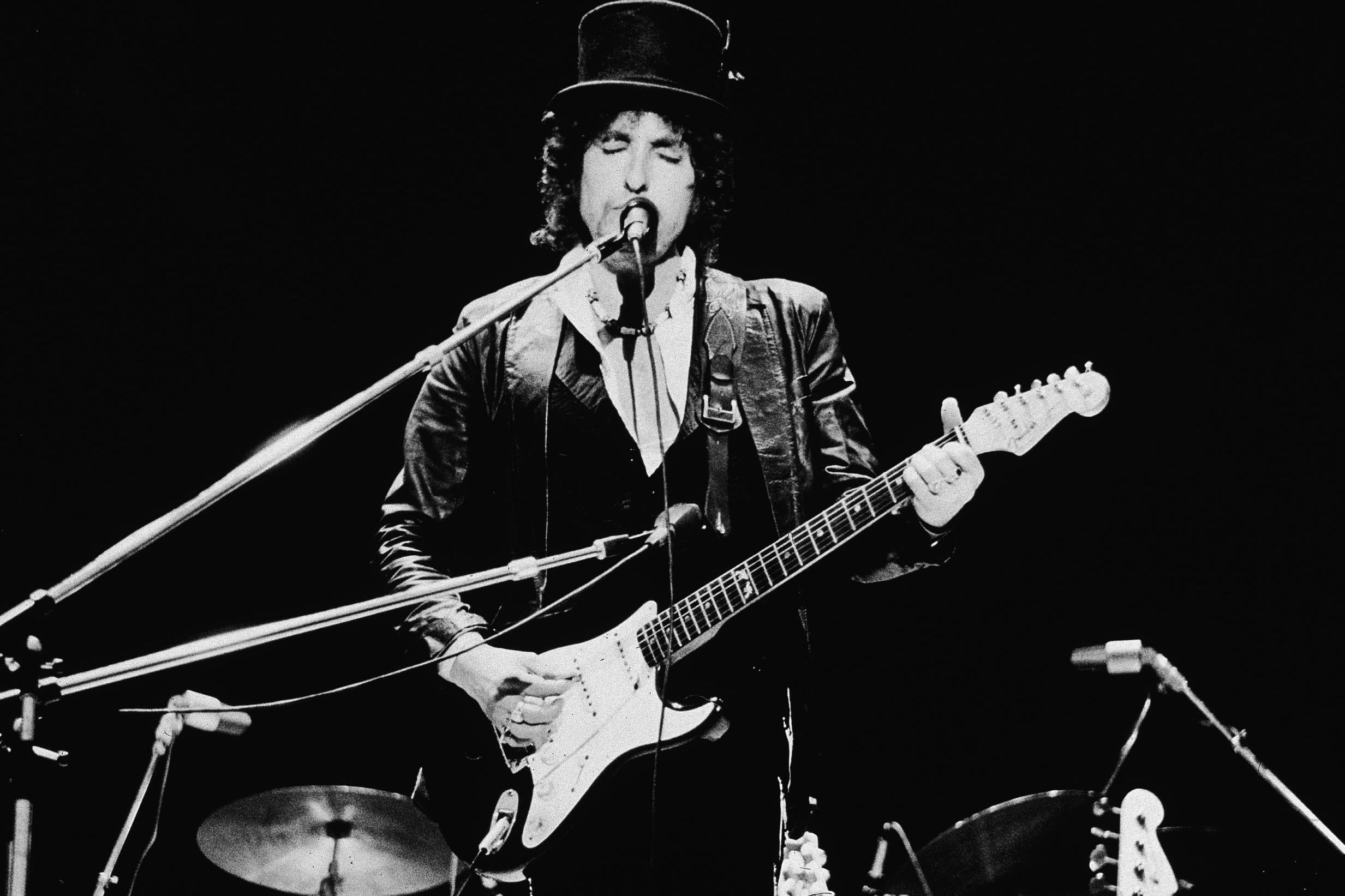 Bob Dylan performs during the Blackbushe Pop Festival, Hampshire, England, on 17 July, 1978. (Photo by Express Newspapers/Getty Images)