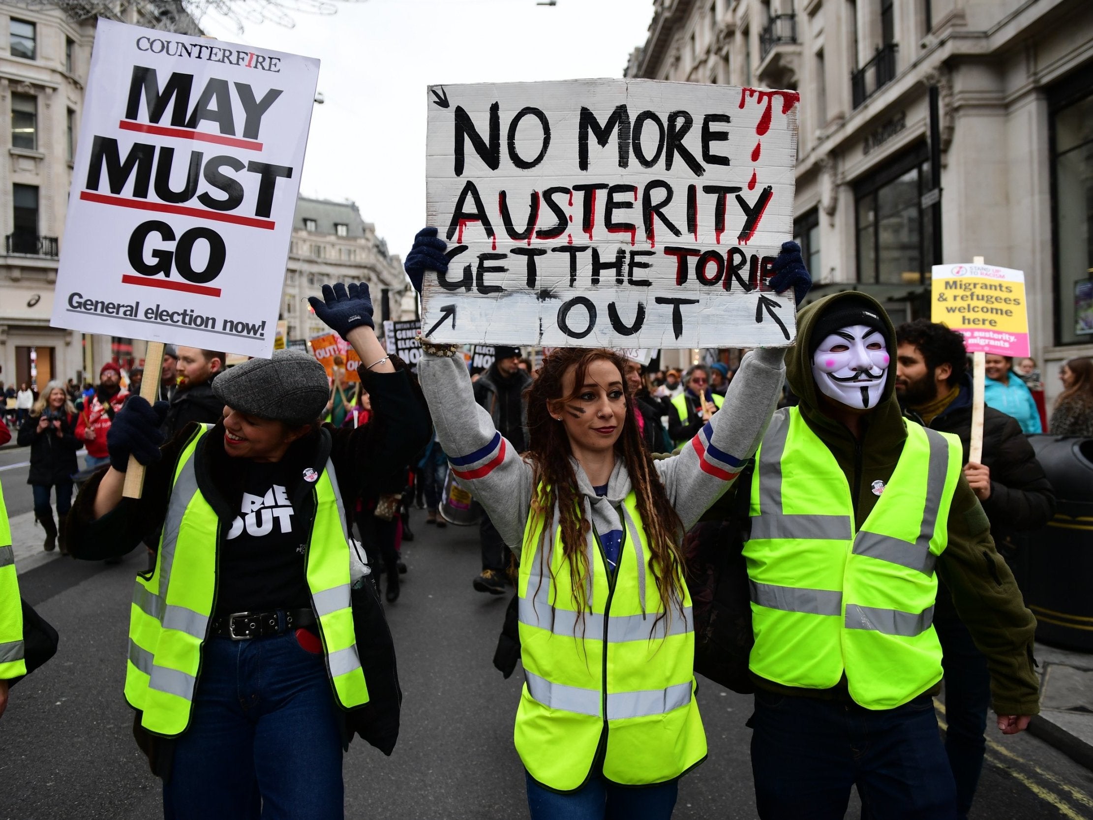 Demonstrators wearing yellow vests make their way to Westminster on 12 January