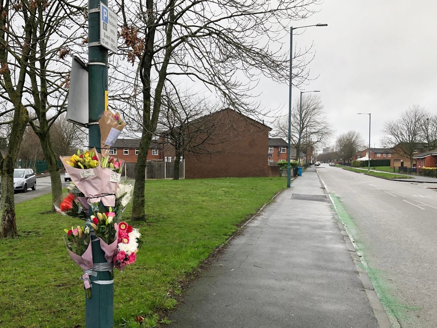 Floral tributes at the scene where an 11-year-old boy was killed in a hit-and-run collision in Beswick, Manchester, shortly after 6.10pm on 12 January, 2019.