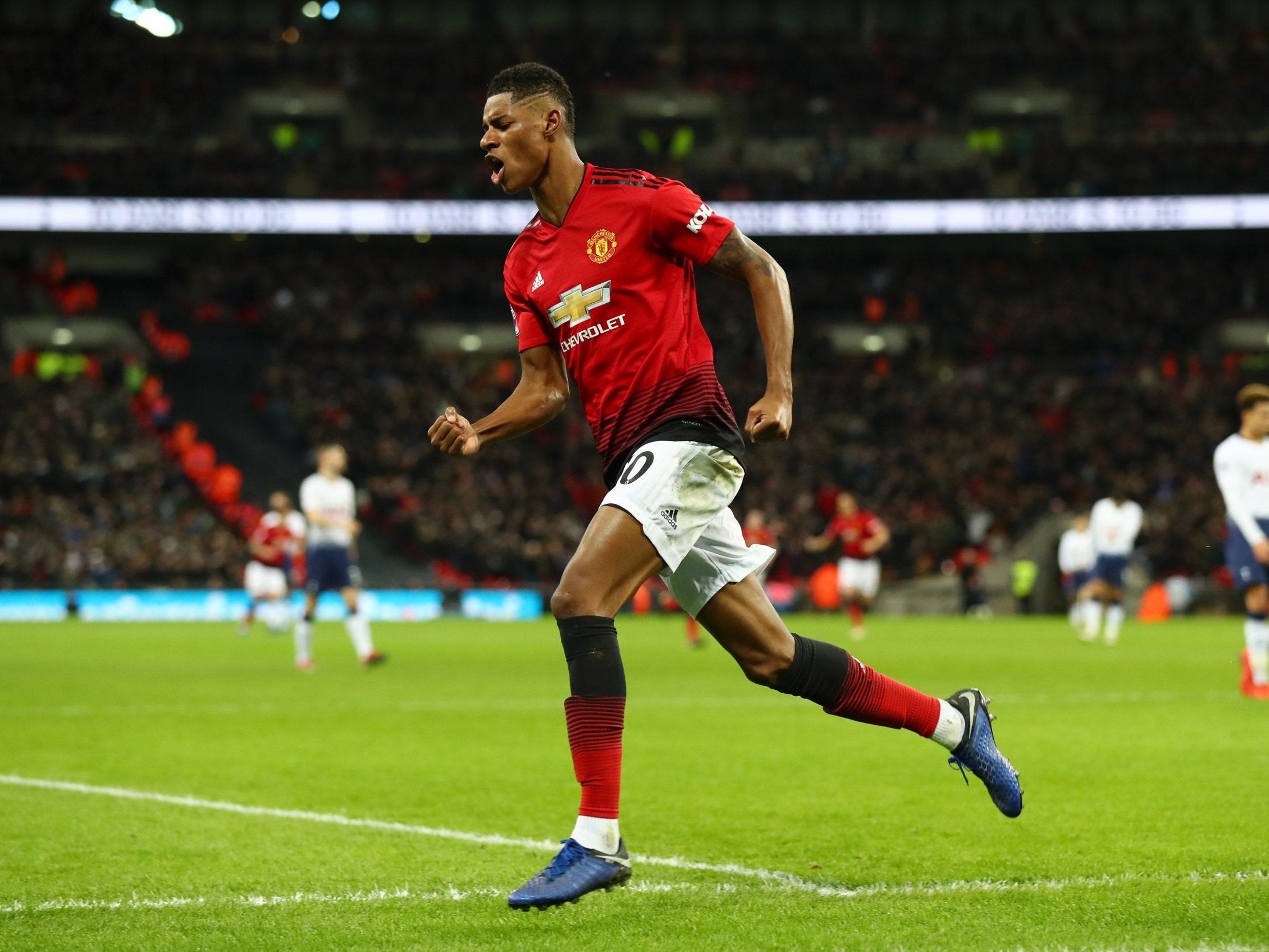 Marcus Rashford celebrates opening the scoring at Wembley Stadium