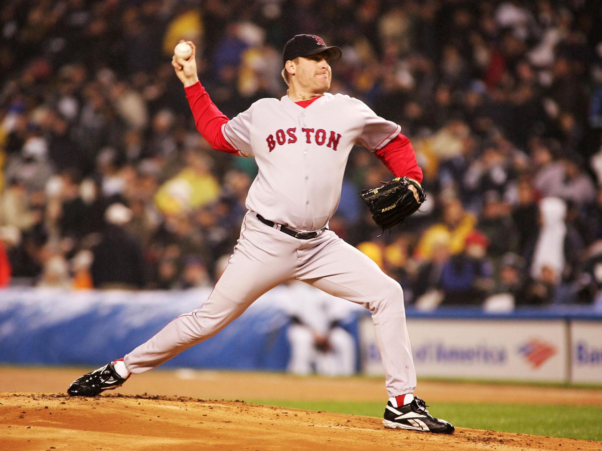 Curt Schilling of the Boston Red Sox throws a pitch against the New York Yankees during an American League Championship Series game in 2004 (Getty)