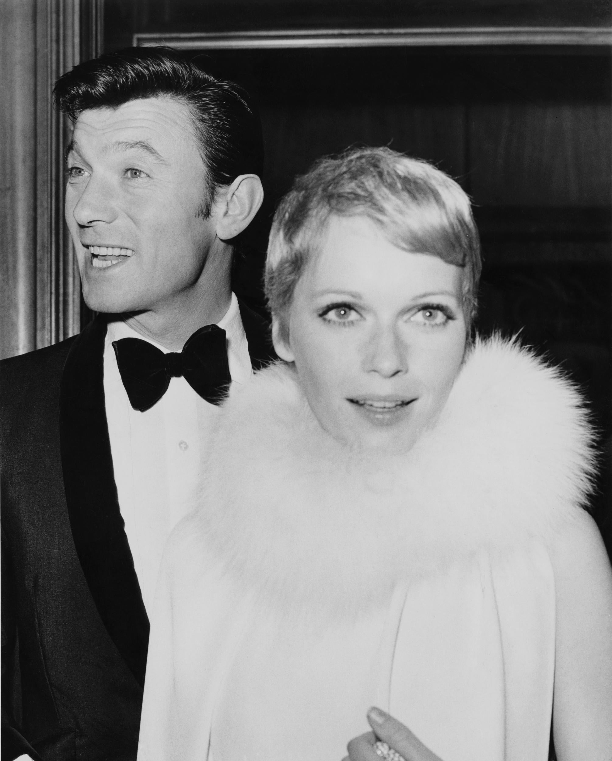 Mia Farrow with Laurence Harvey in 1967