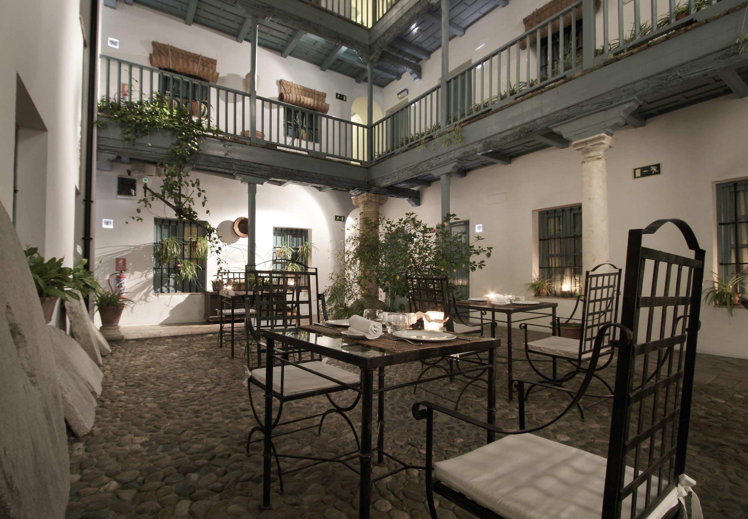 Sip a sherry or two in the candle-lit patio area of Hospes Las Casas del Rey de Baeza