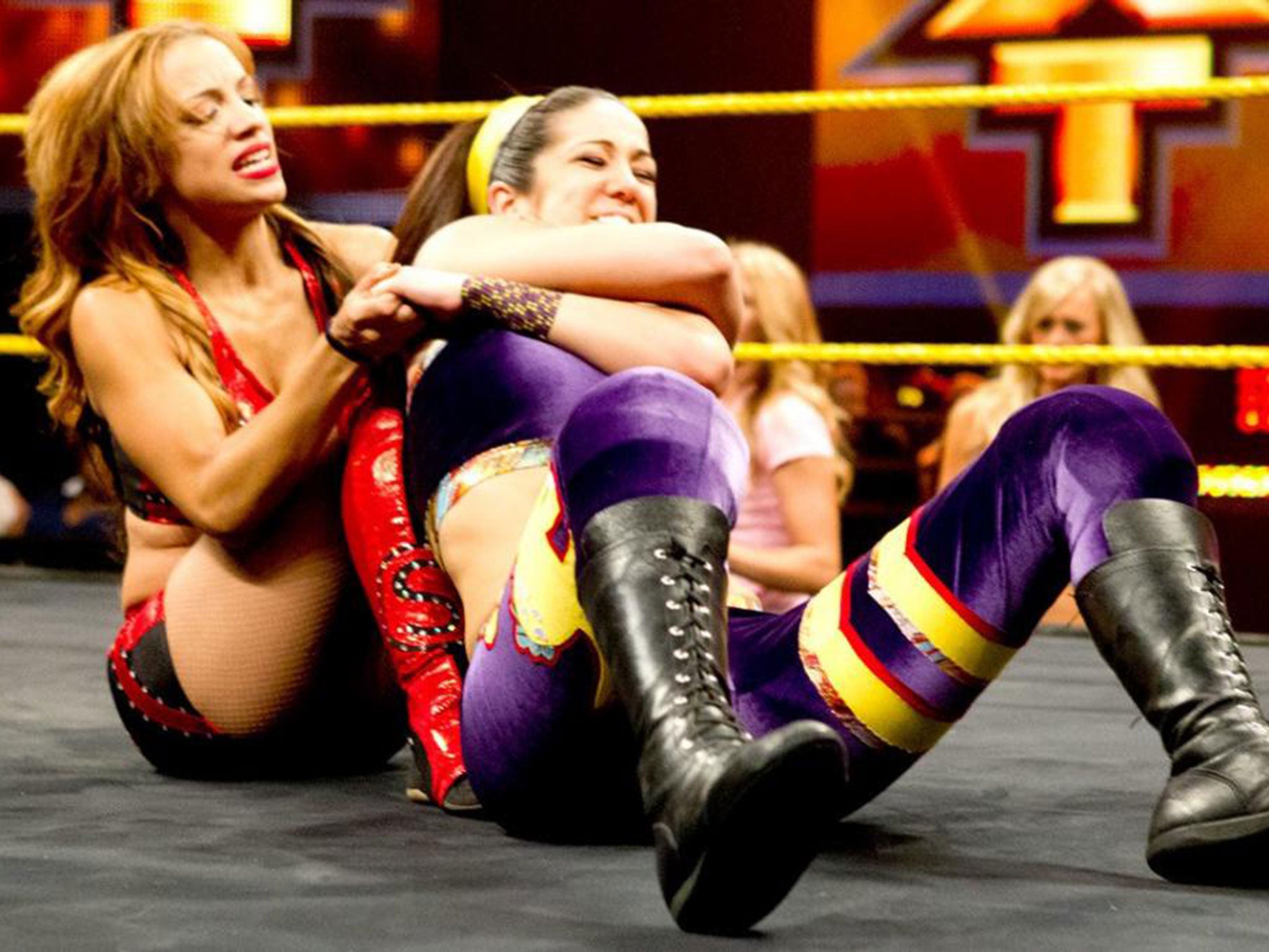 Both Banks (left) and Bayley (right) came through the NXT ranks to reach the WWE