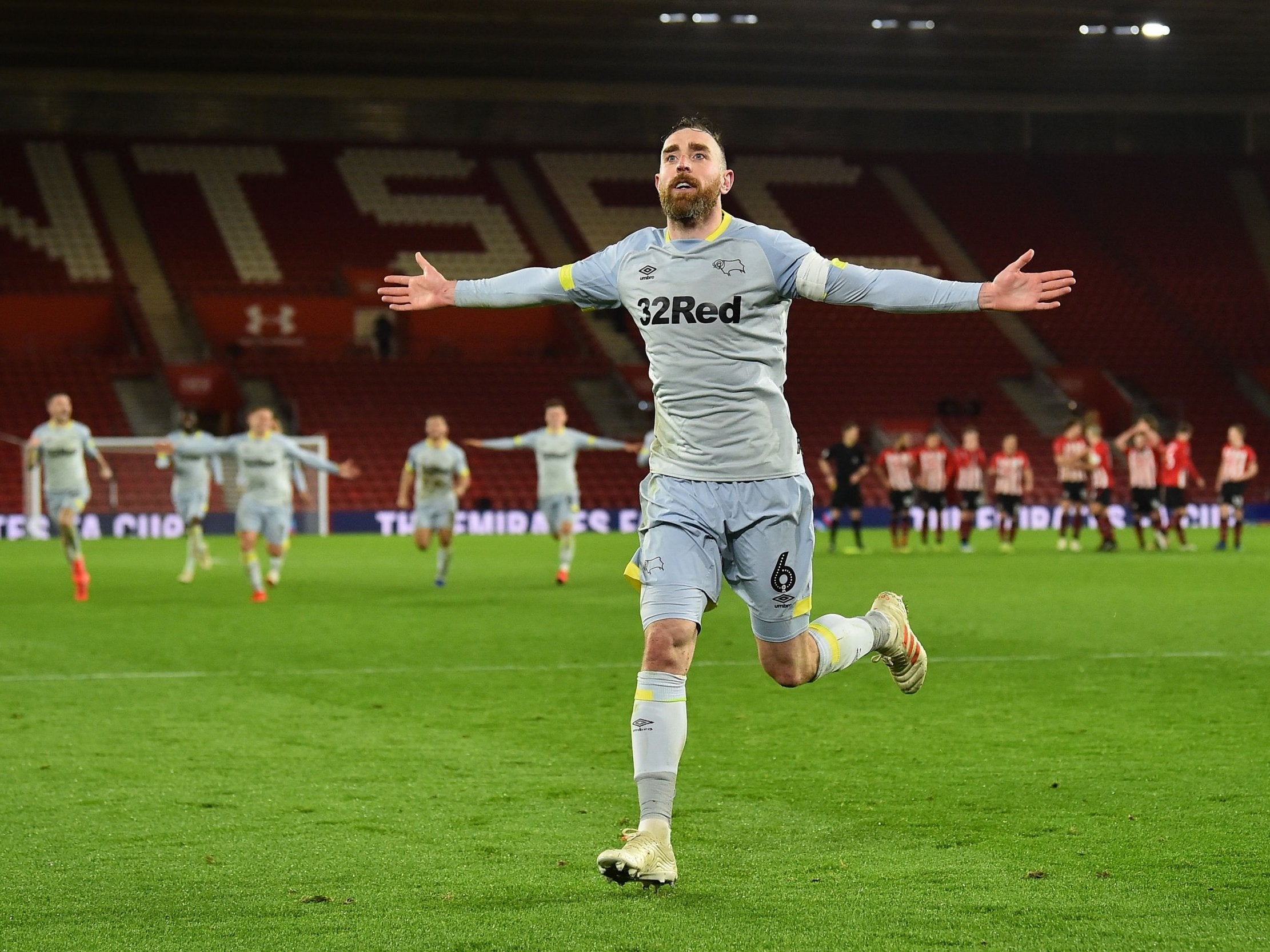 Richard Keogh celebrates after scoring the winning penalty