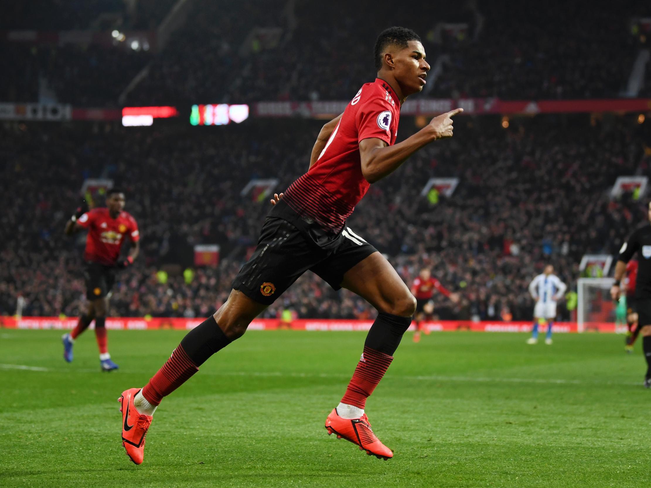 Marcus Rashford celebrates his fourth goal in four league matches