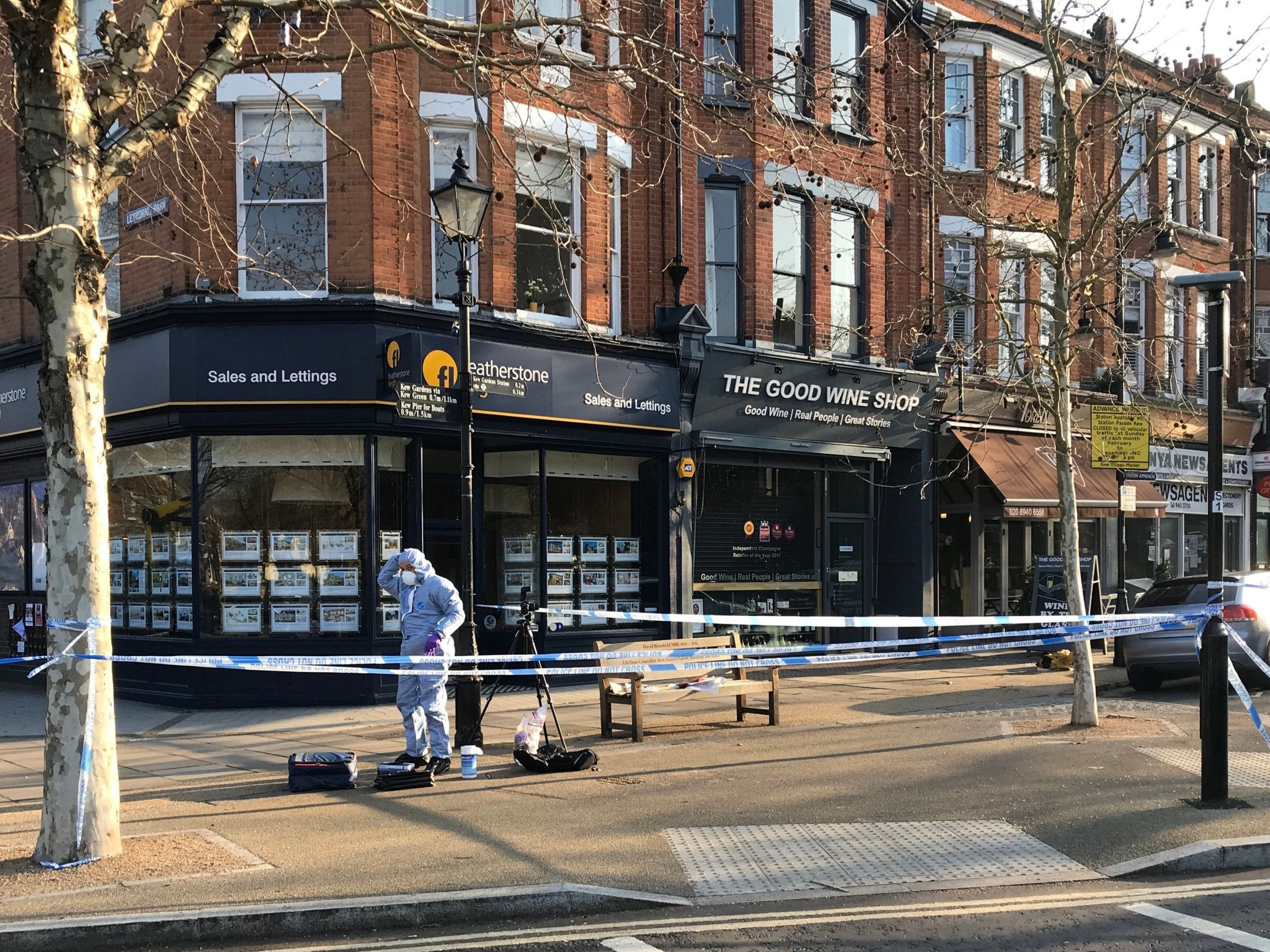 Forensic investigators at the scene where a man was stabbed at Royal Parade, close to Kew Gardens, west London, on Sunday