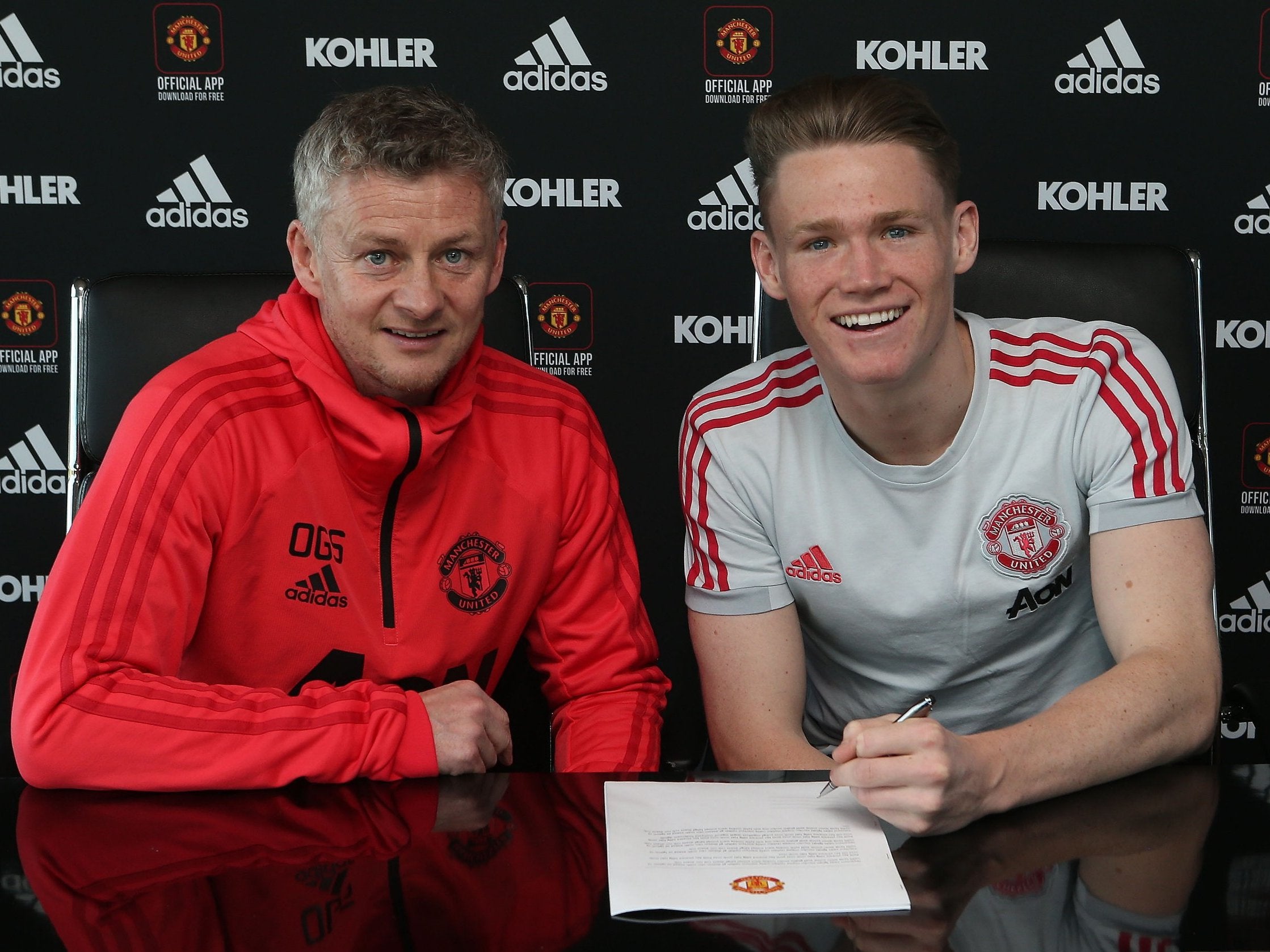 Ole Gunnar Solskjaer poses with Scott McTominay