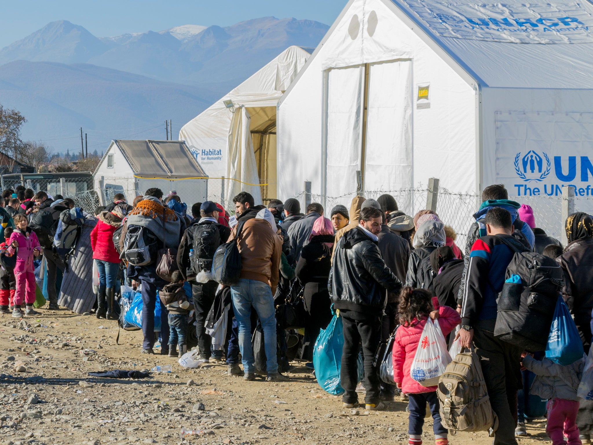 Refugees waiting to register in arefugee camp in Macedonia after having crossed the border with Greece