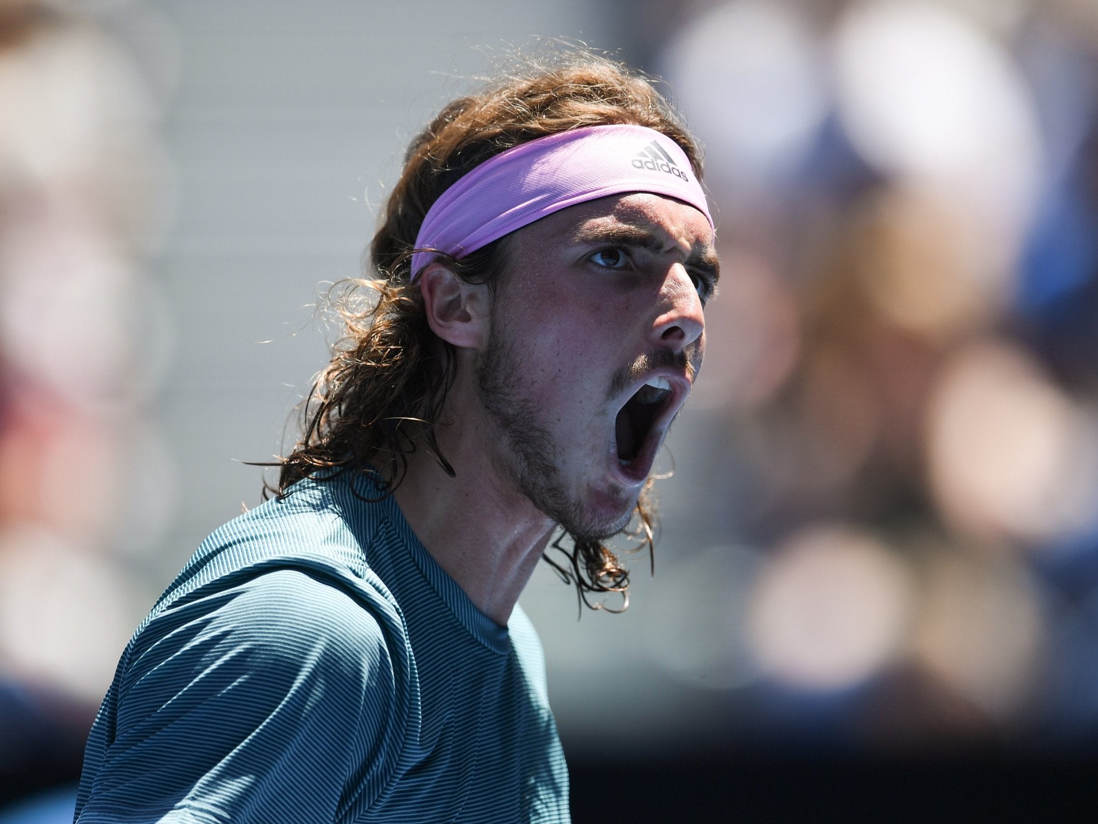 Stefanos Tsitsipas roars in celebration against Roberto Bautista Agut