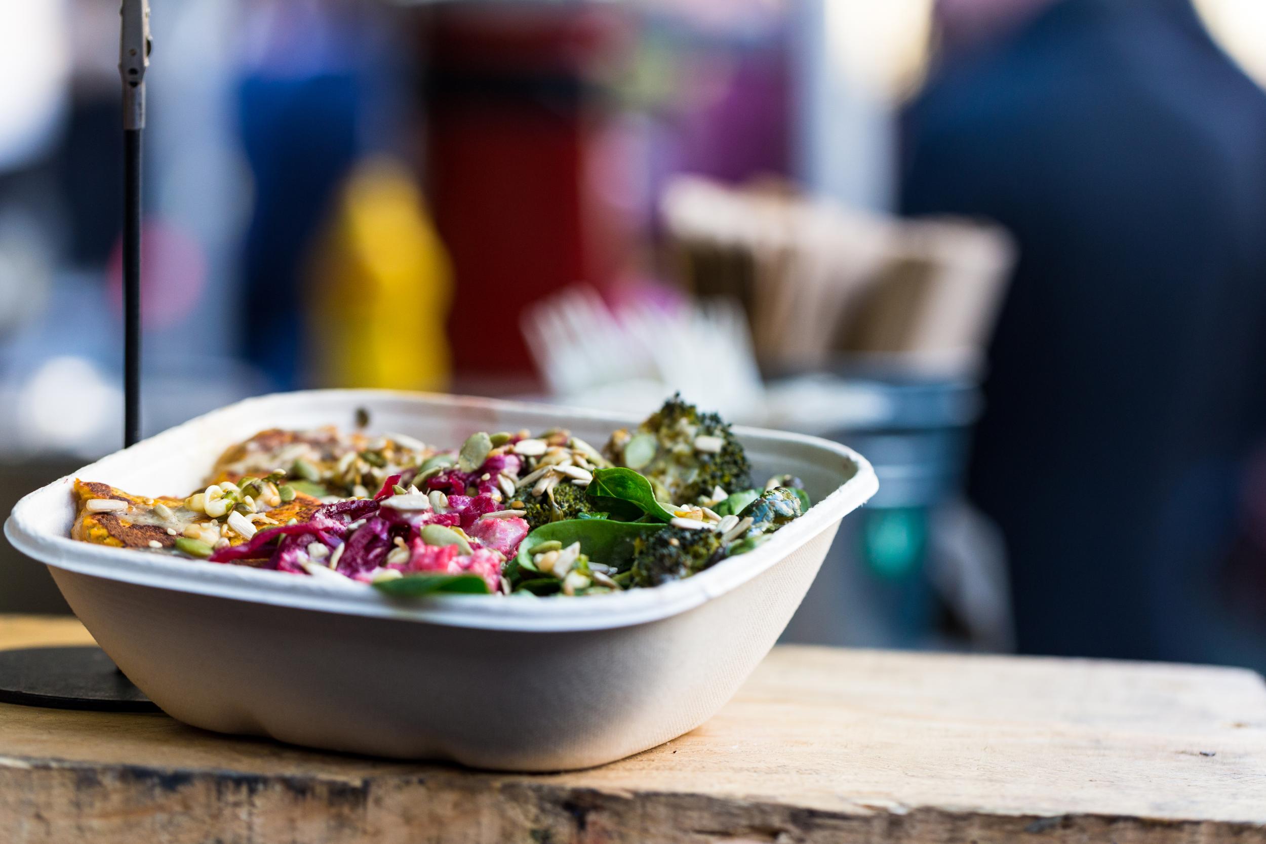 Close up of vegan vegetarian take away food for sale at Borough Market, London