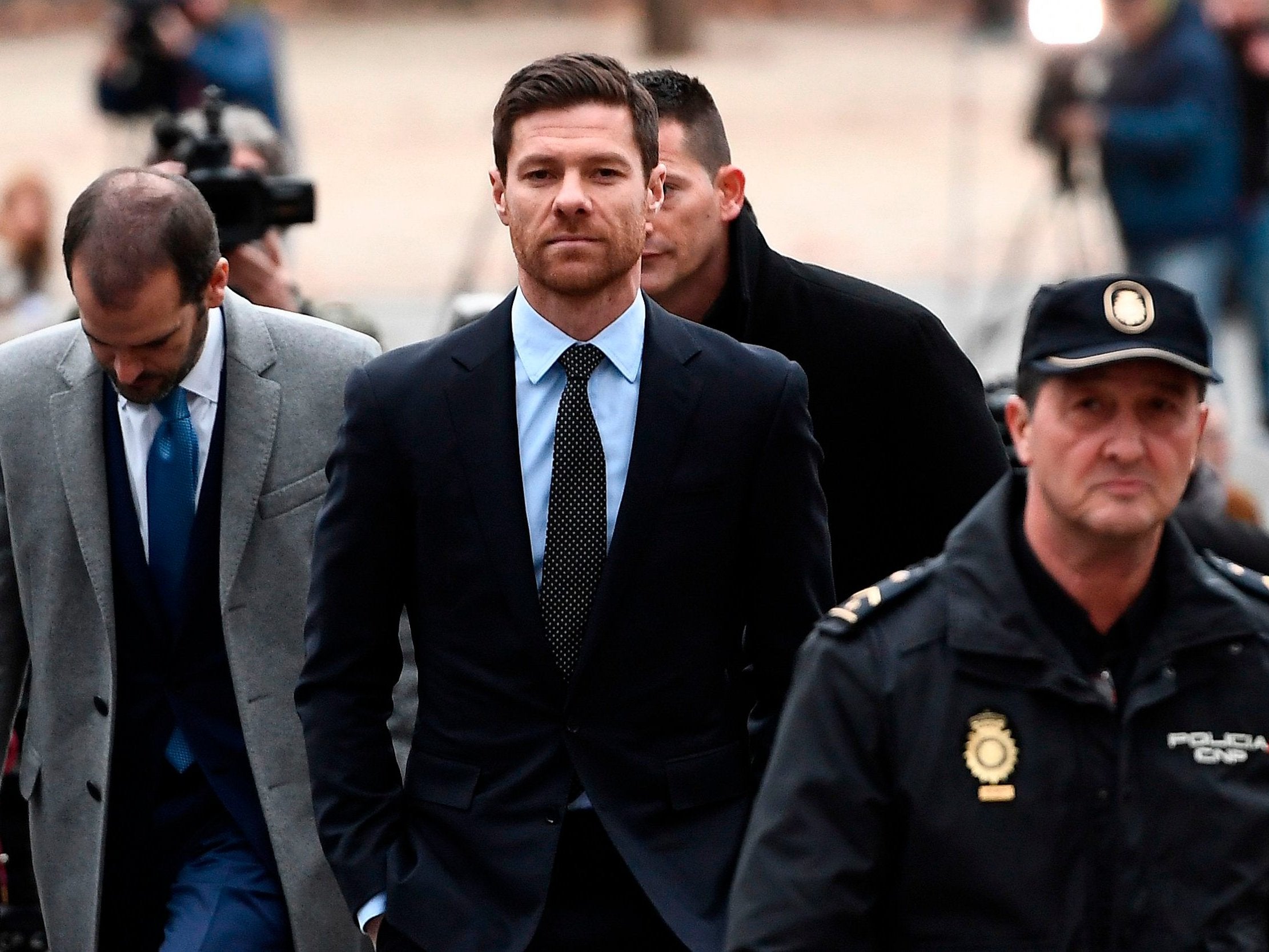 Xabi Alonso arrives at court in Madrid (AFP/Getty)