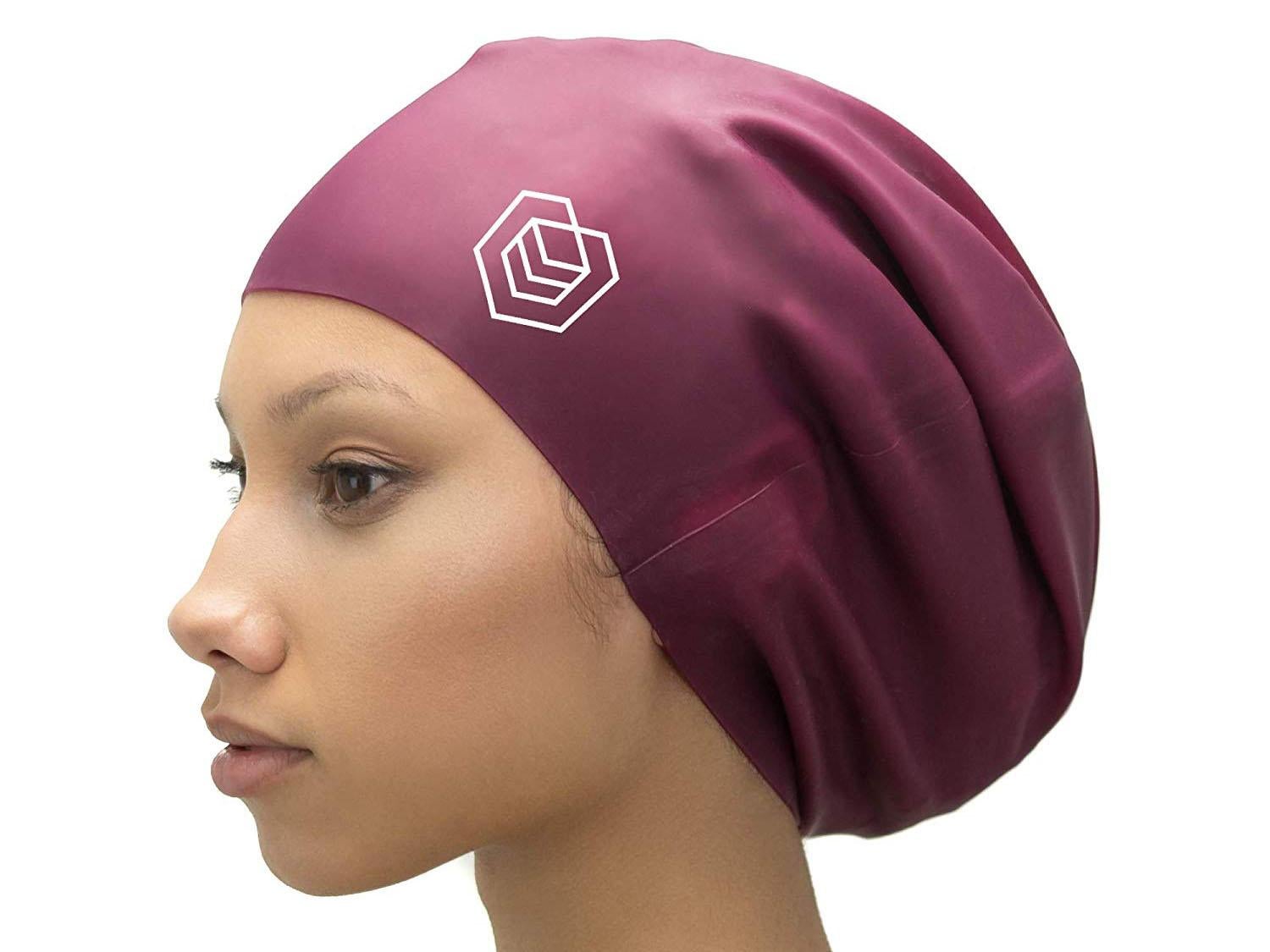 Keep flyaways, long locks and afro hair tucked neatly away with this swim cap