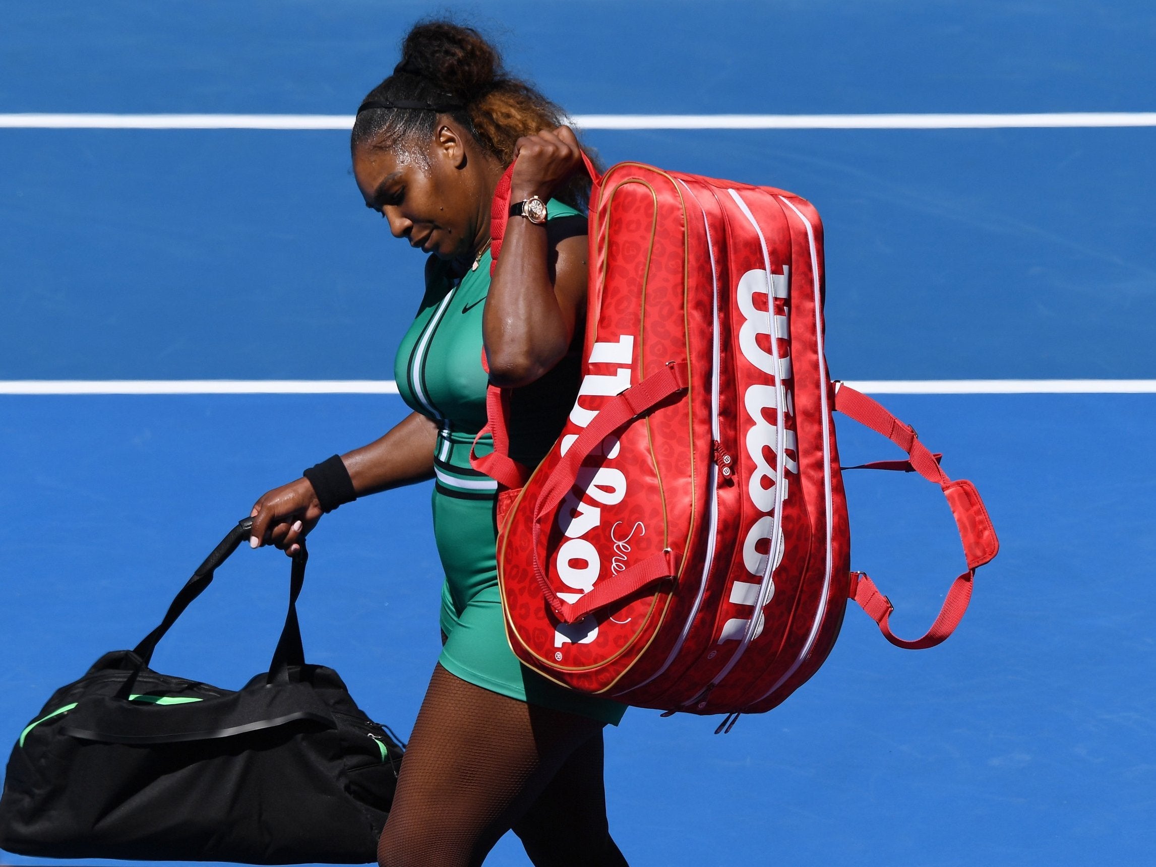 Williams leaves the court after her defeat