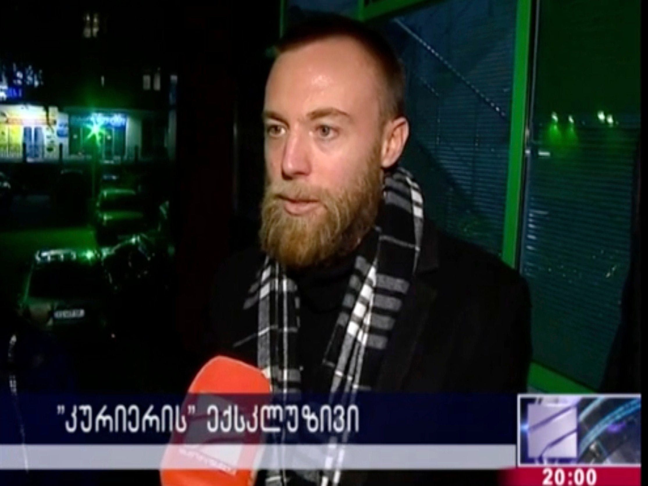 Shepherd speaks to the media at the police station in Tbilisi, Georgia