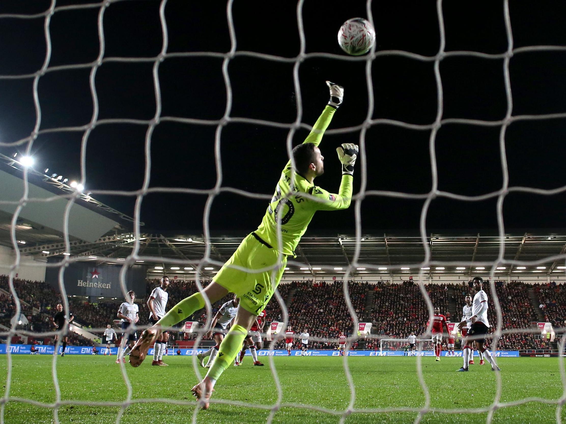 Niclas Eliasson beats Remi Matthews to score Bristol City's second