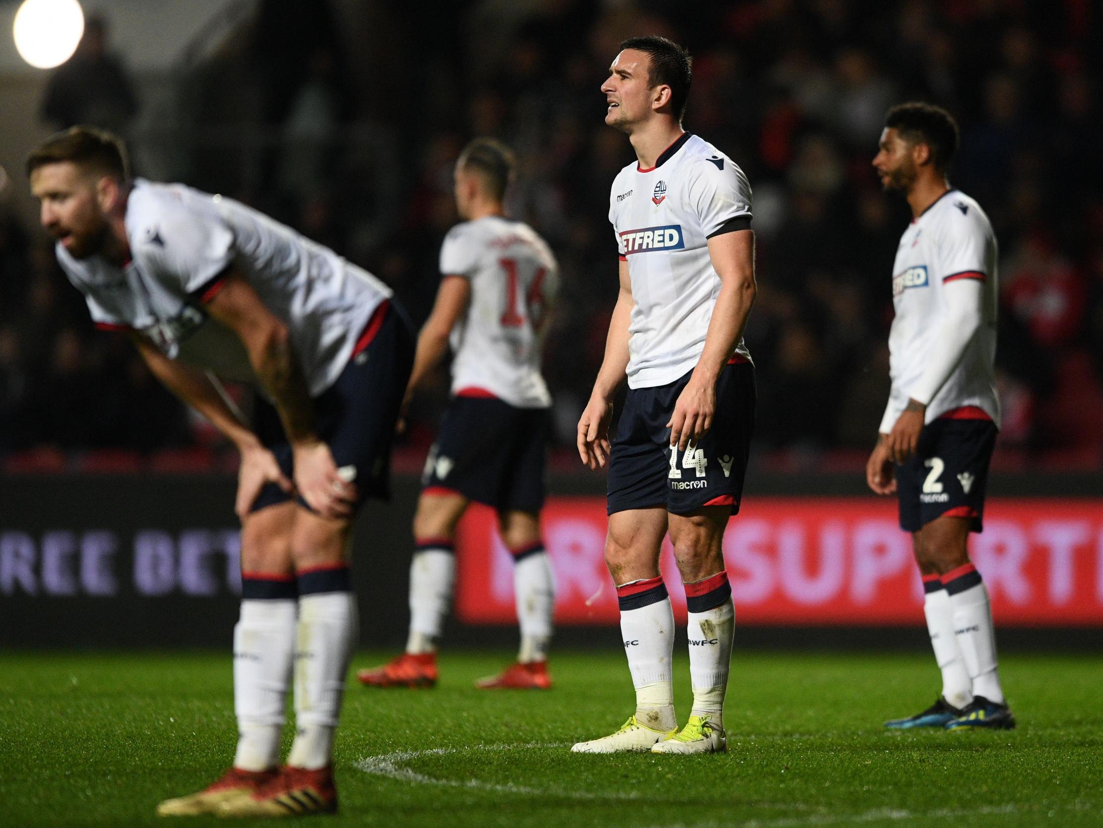 Bolton’s players react after their FA Cup defeat