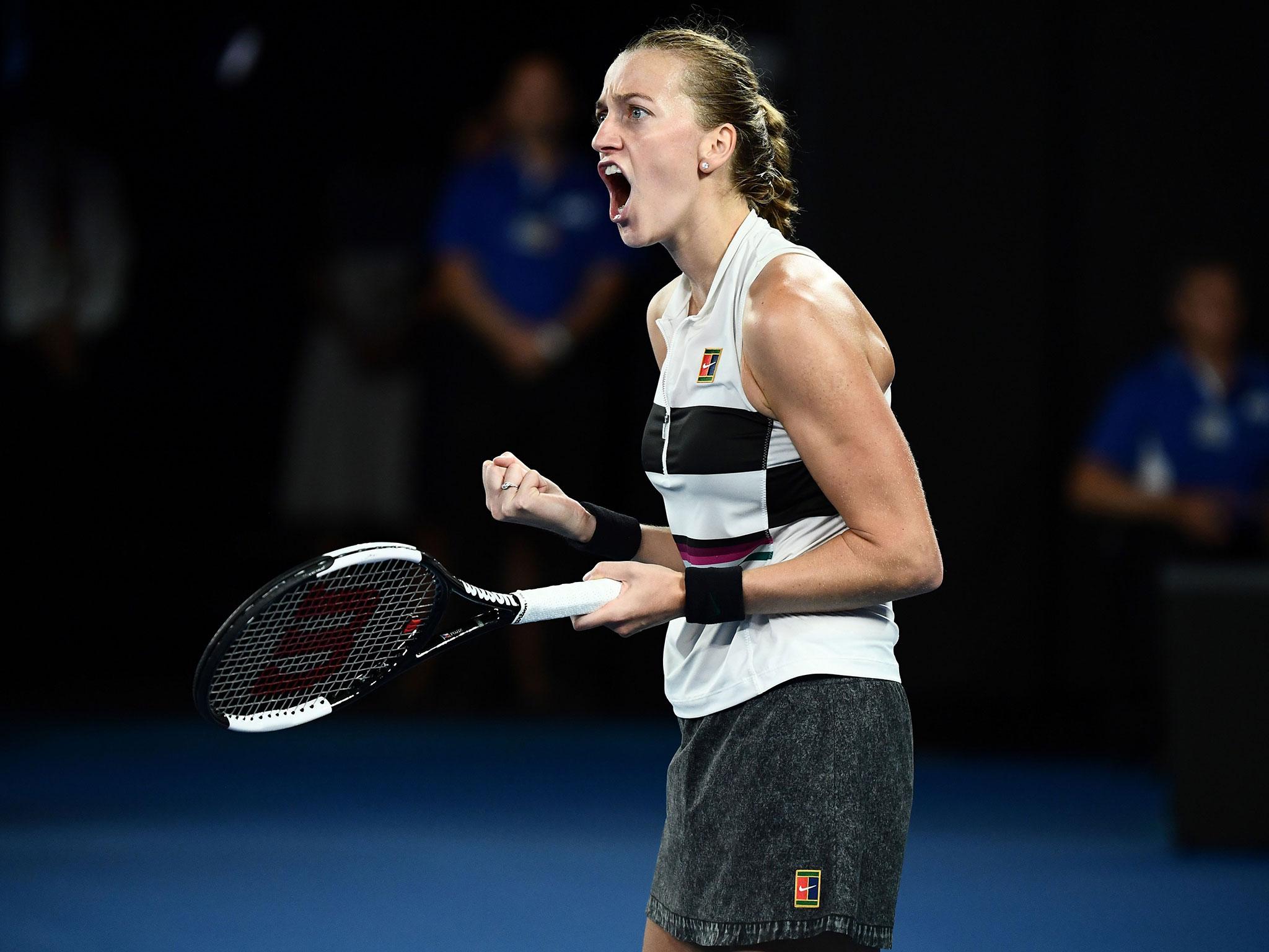 Kvitova roars in delight after winning the second set to level the final