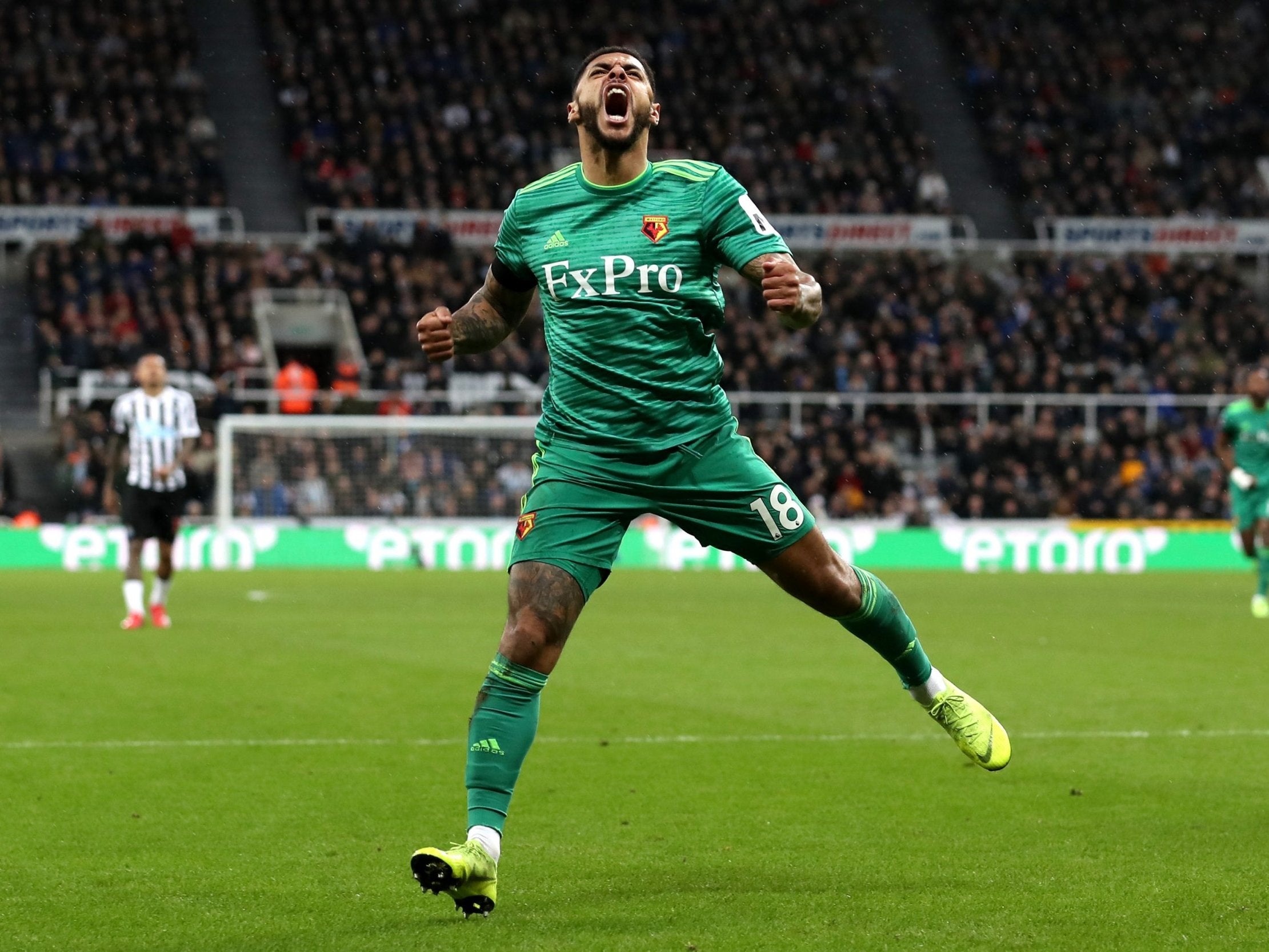 Andre Gray celebrates breaking the deadlock