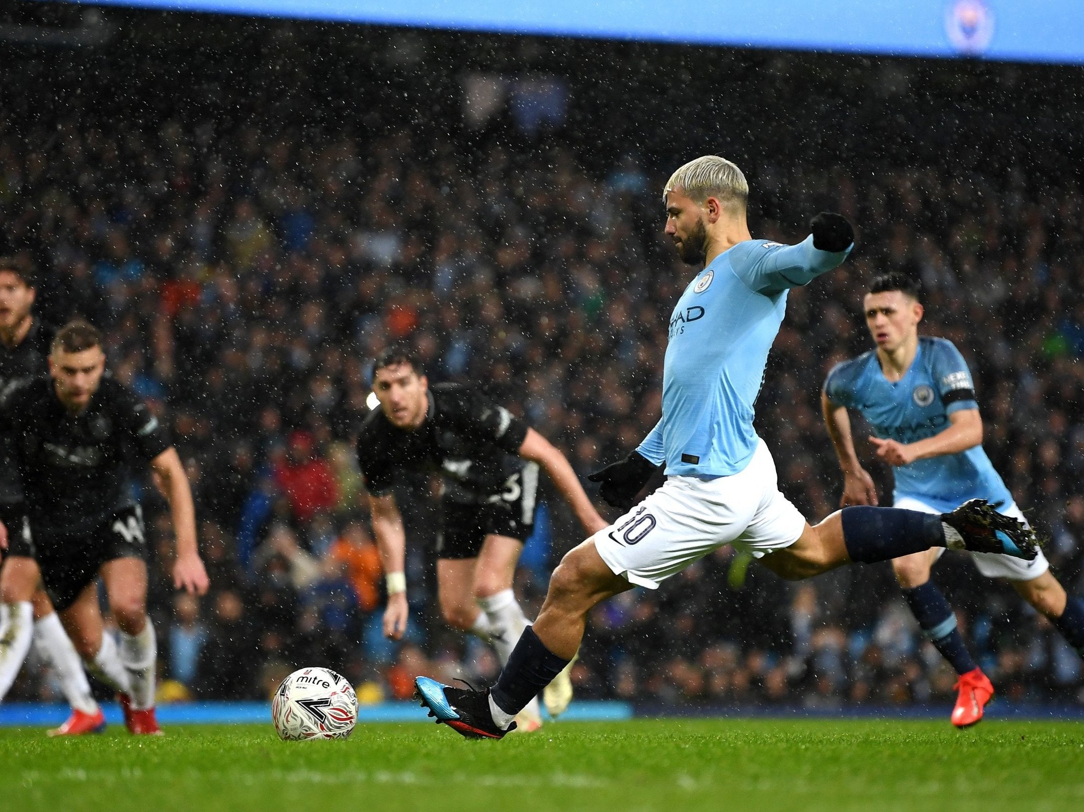 Sergio Aguero came off the bench to score City's fifth from the spot