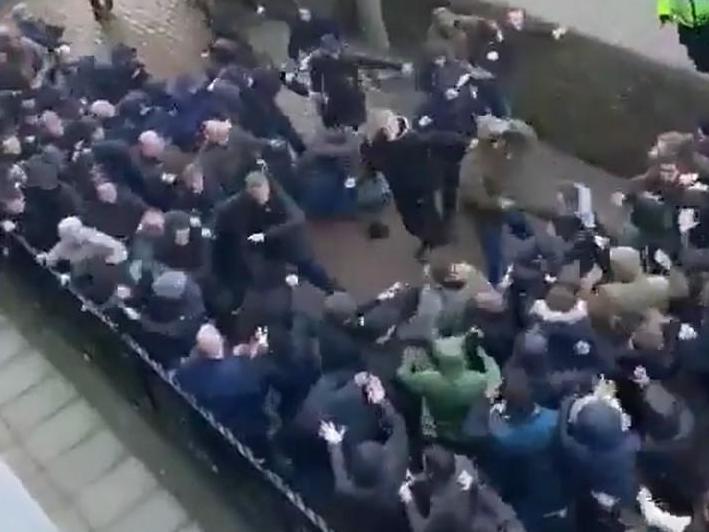 Millwall and Everton fans fight before their teams play in the FA Cup (Screengrab)