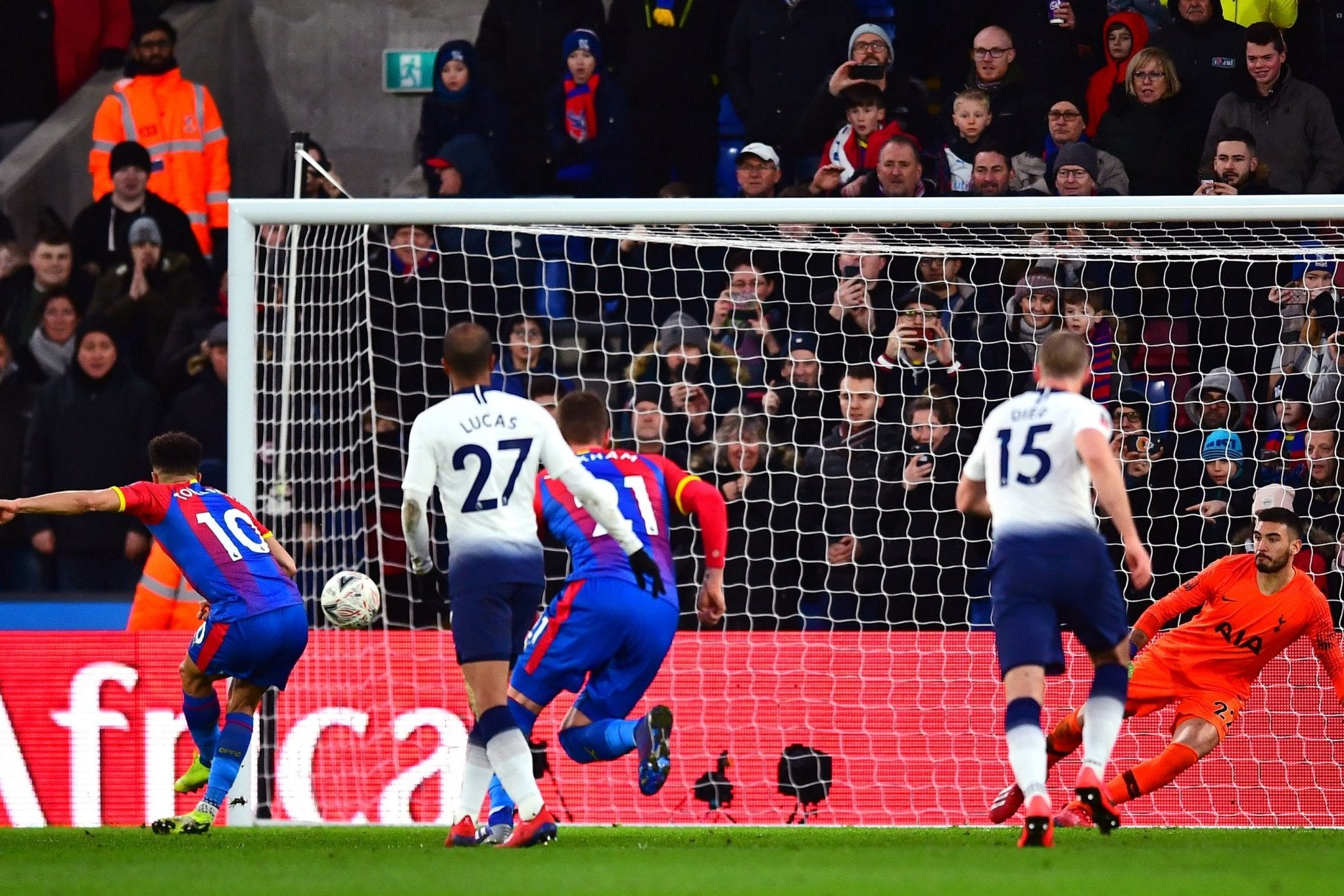 Andros Townsend hits his penalty past Hugo Lloris