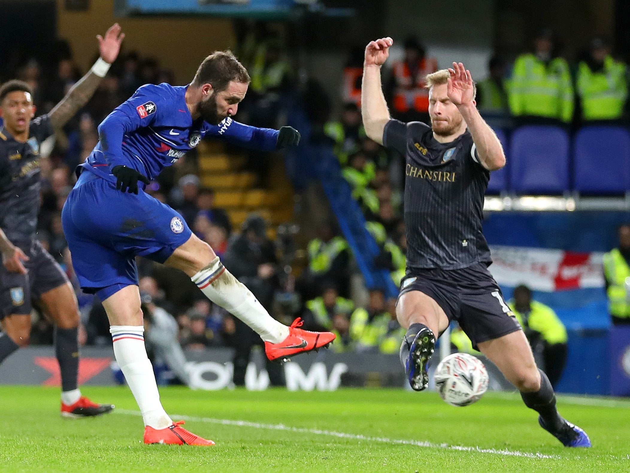 Gonzalo Higuain has his first-half shot blocked by Tom Lees