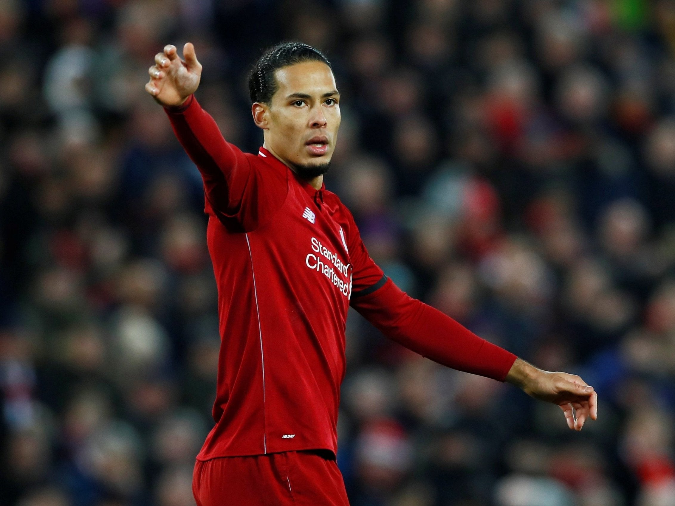 Van Dijk is a doubt for Liverpool's Premier League clash with Leicester (Reuters)