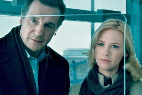 (Neeson and January Jones in 'Unknown' Warner Bros Pictures)