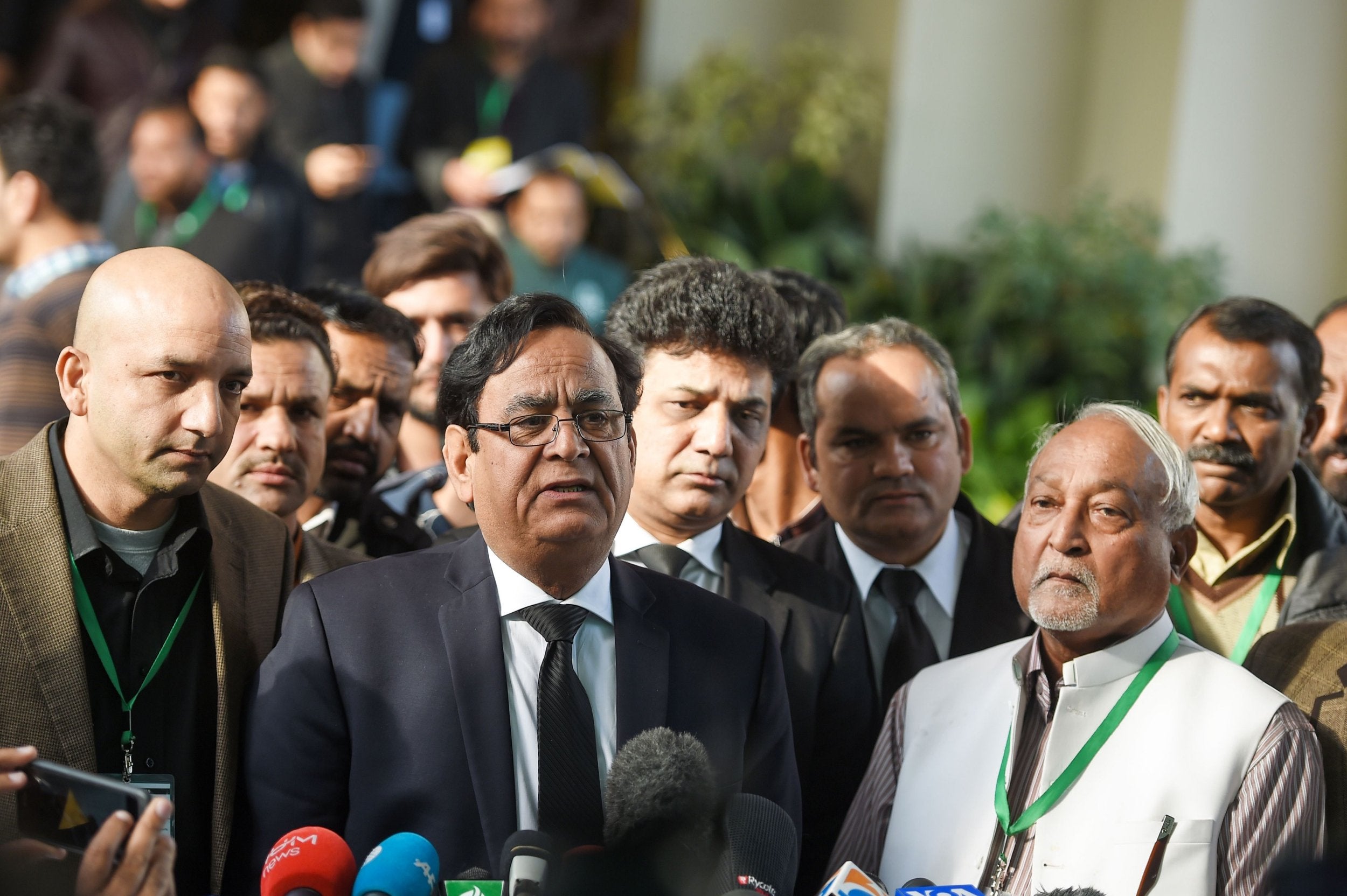 FILE: Saif-ul-Mulook (C), the lawyer of Pakistani Christian Asia Bibi, speaks to the media outside the Supreme Court building in Islamabad on 29 January 2019. An eight-year-old boy has been charged with blasphemy in Pakistan