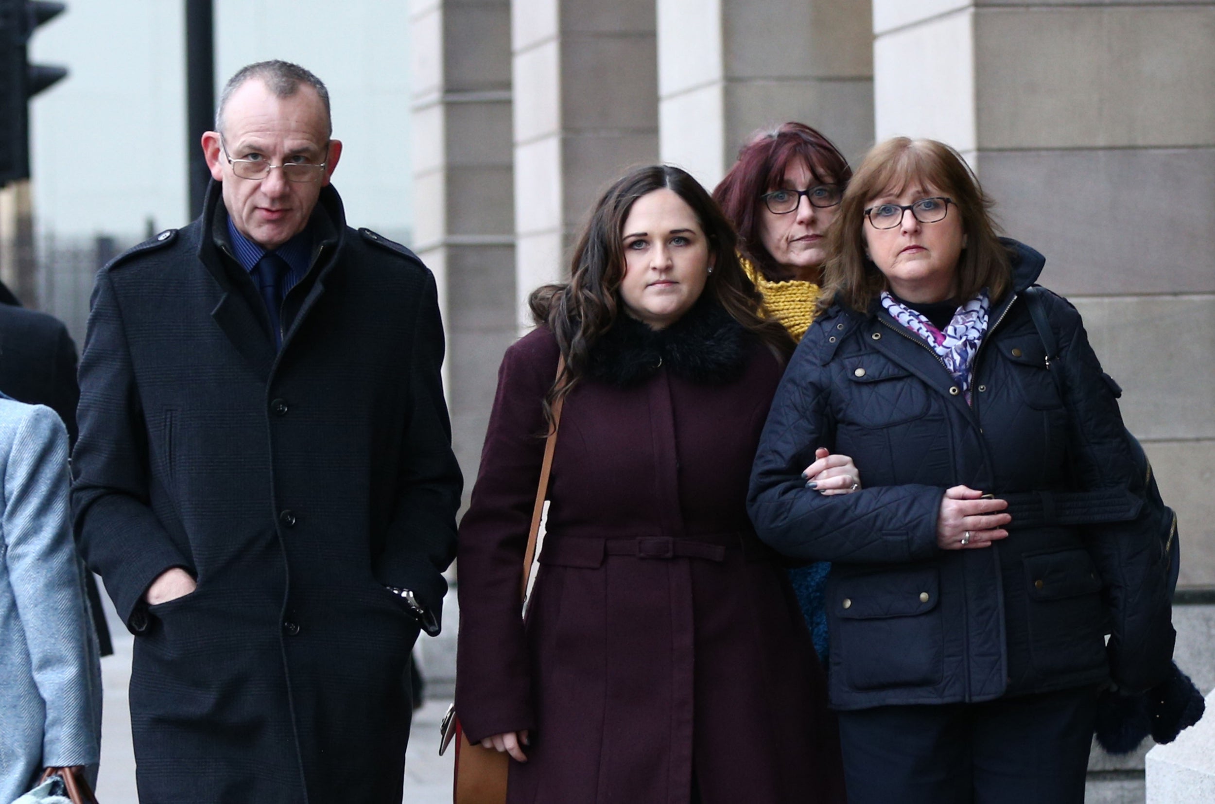 Charlotte Brown’s father Graham Brown (left), with her twin sister Katie Brown (second left) and her mother Roz Wickens (right)