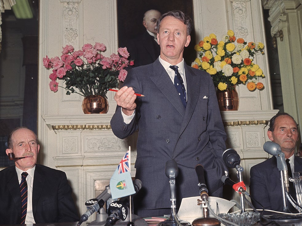 Stubborn and humourless: Smith, here in 1965, was overtaken by Robert Mugabe in 1980