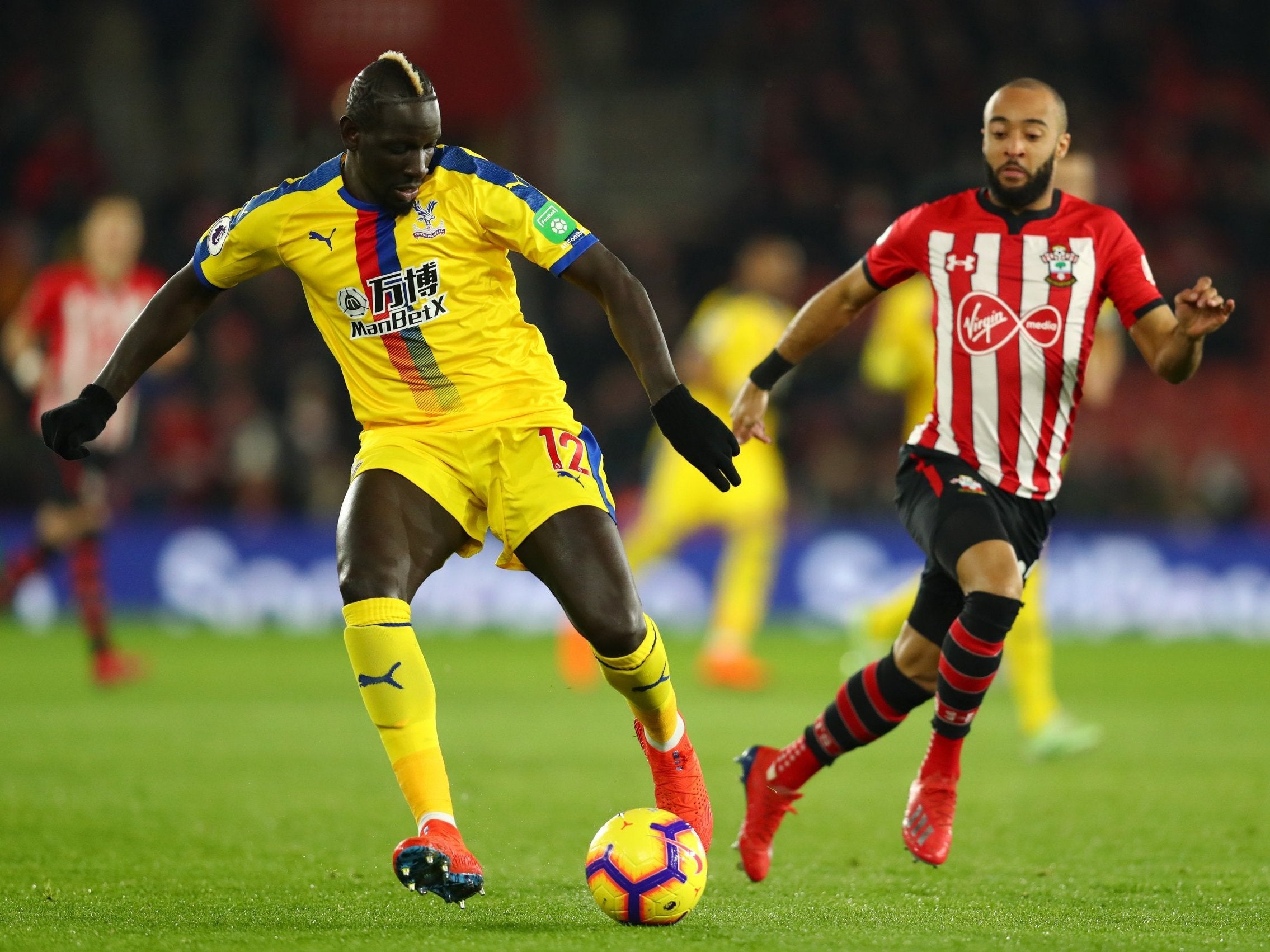 Nathan Redmond chases Mamadou Sakho