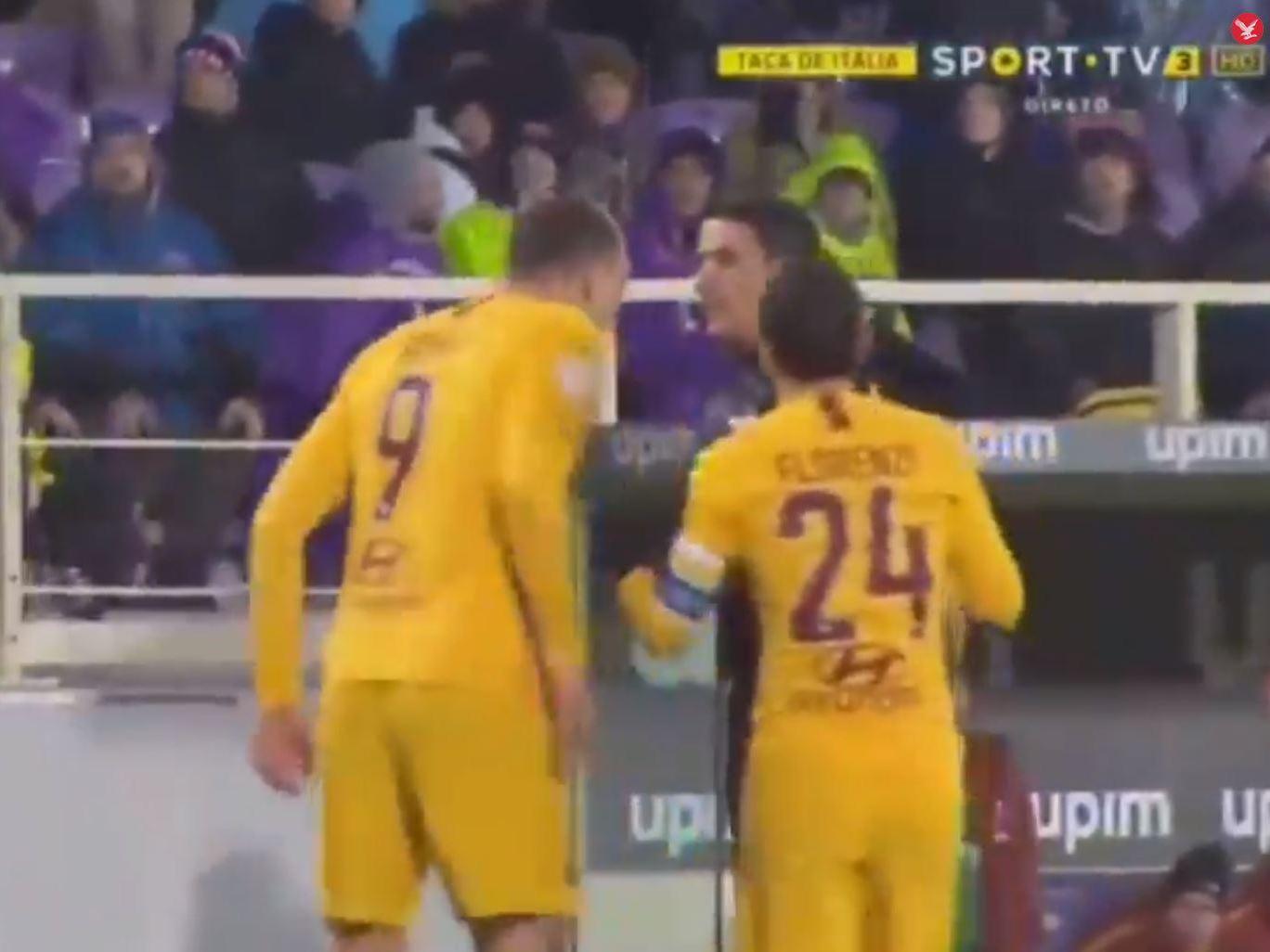 Edin Dzeko appeared to spit at referee Gianluca Manganiello