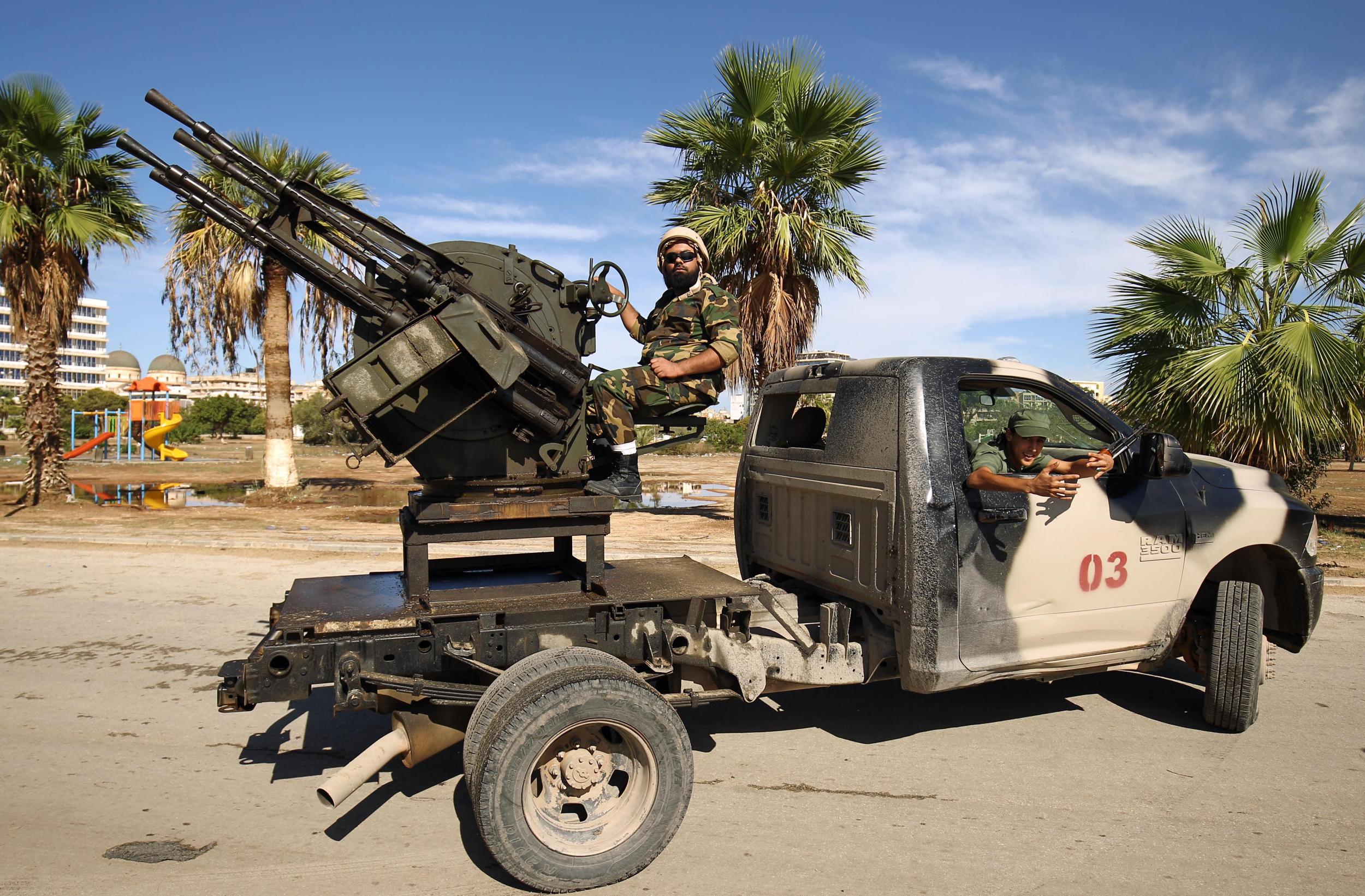 Members of the Libyan security forces loyal to Khalifa Haftar on guard duty in Benghazi