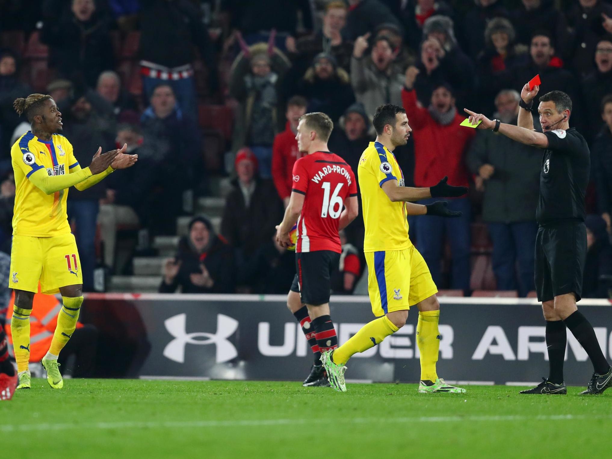 Wilfried Zaha is sent off after sarcastically applauding referee Andre Marriner